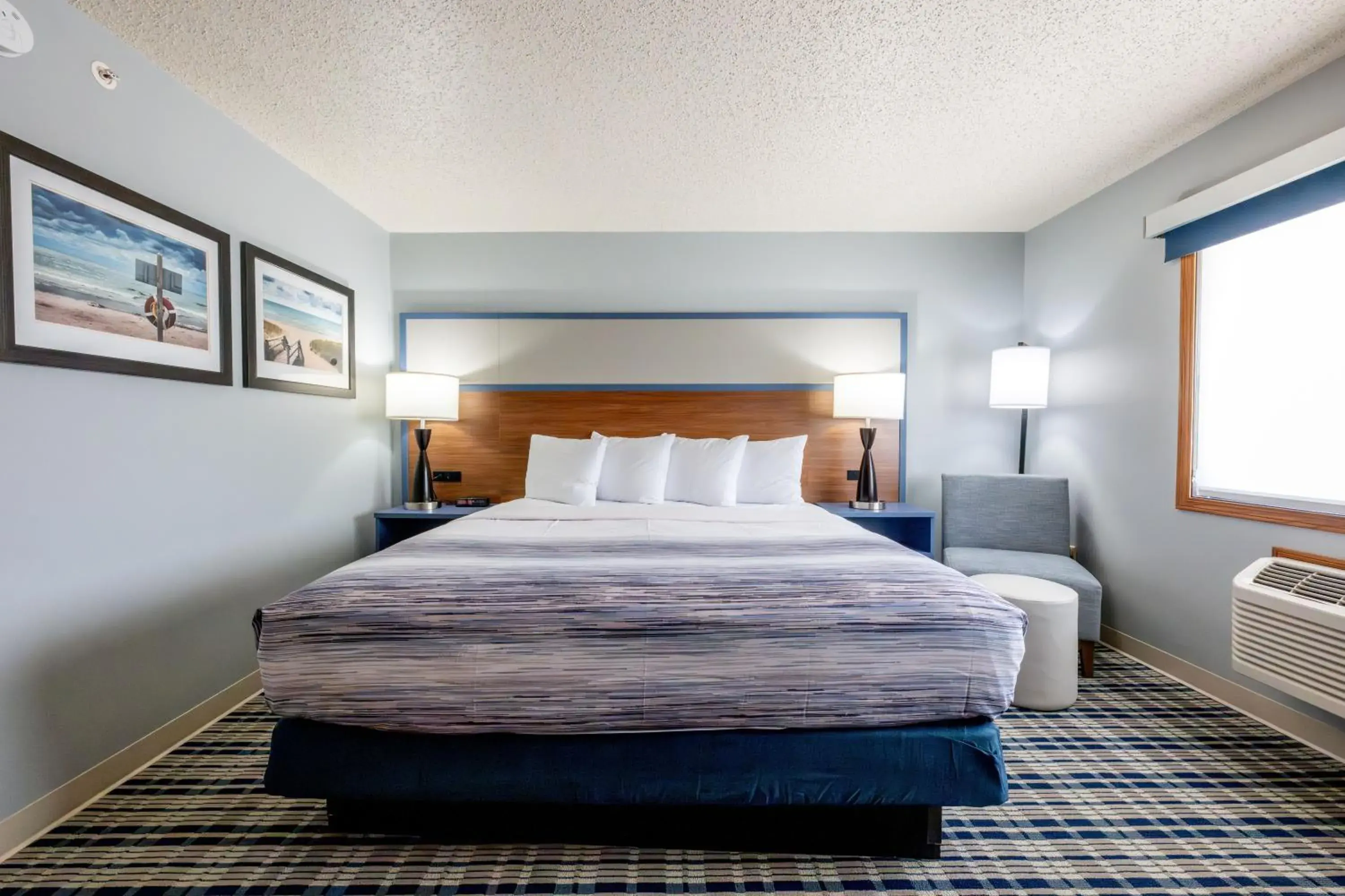 Bed in AmericInn by Wyndham Sturgeon Bay Bed in AmericInn by Wyndham Sturgeon Bay