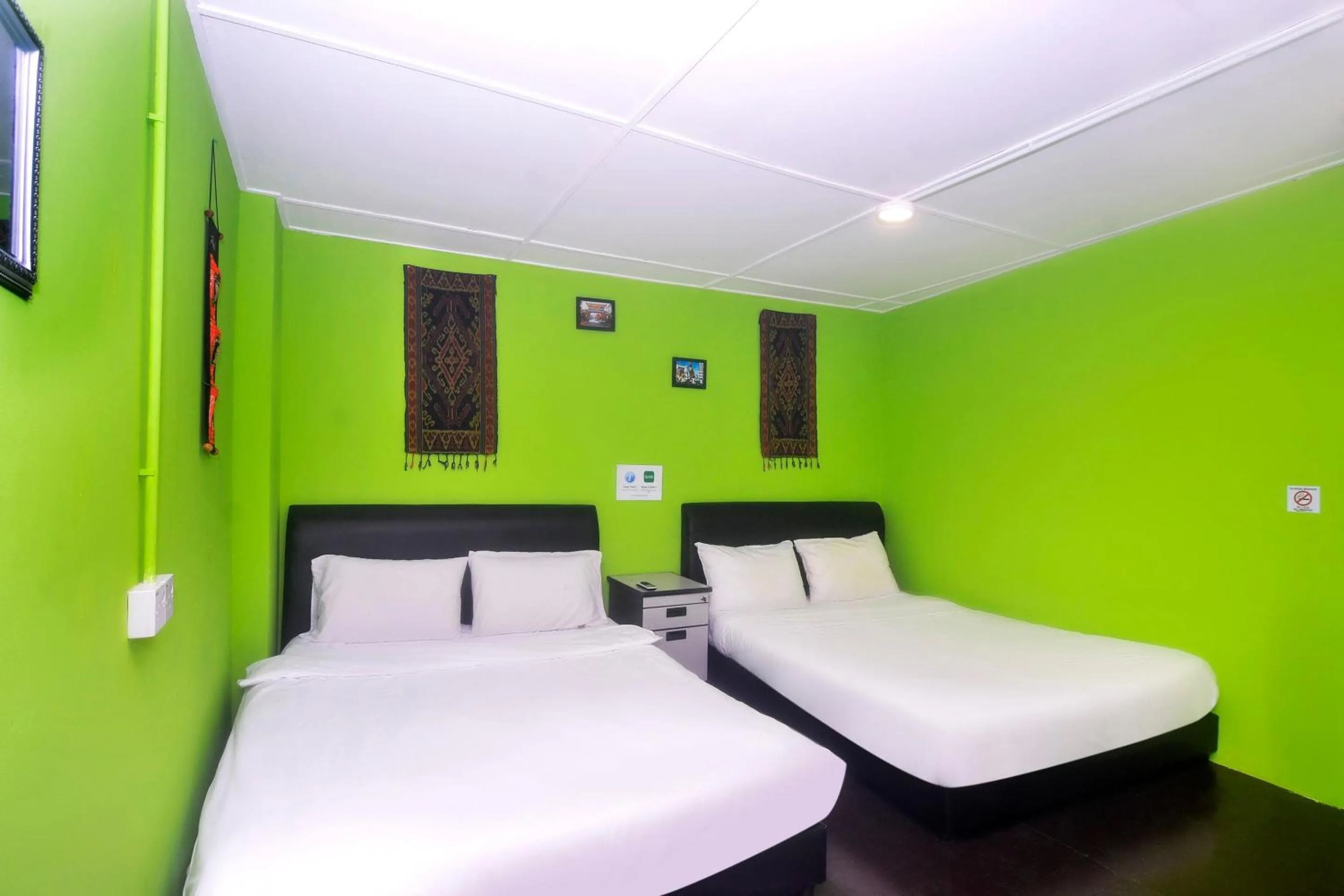 Bedroom in Hotel O Tropical Lodge