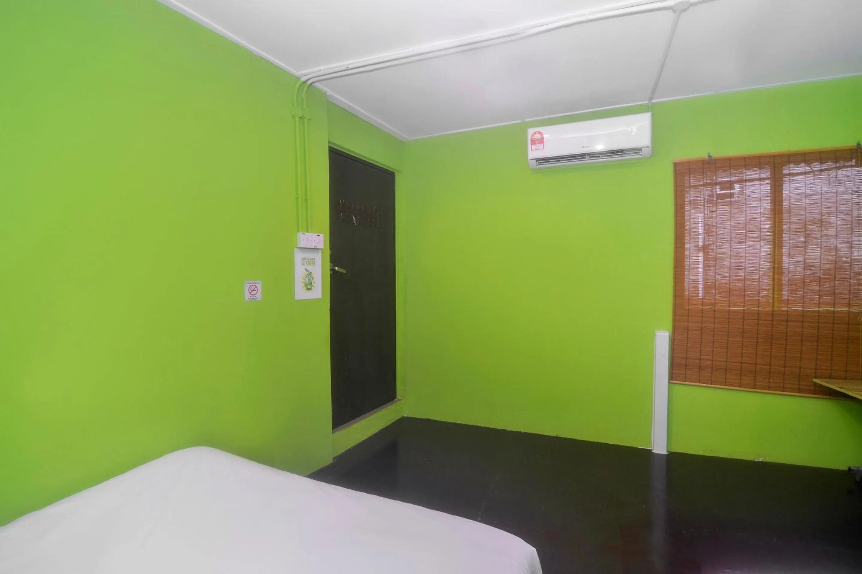 Bedroom in Hotel O Tropical Lodge