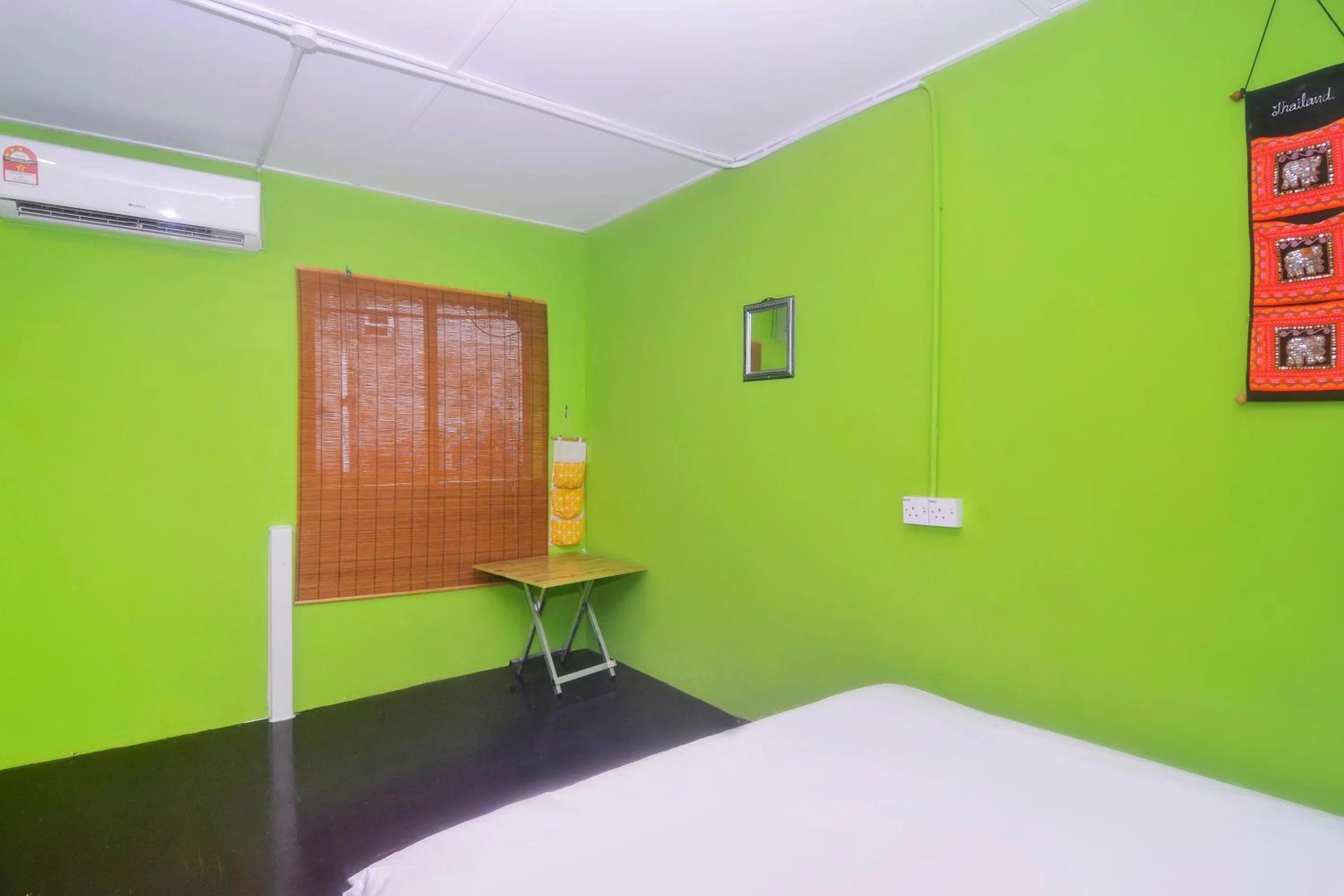 Bedroom in Hotel O Tropical Lodge