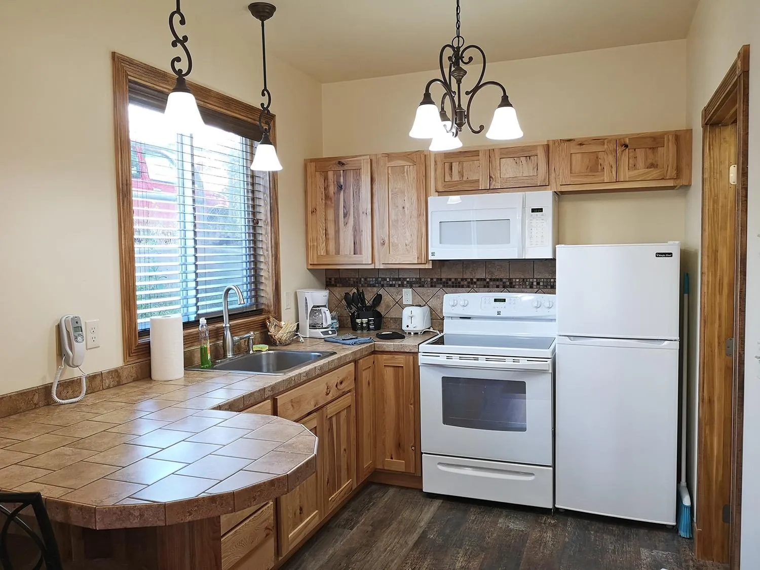 Kitchen or kitchenette in Yellowstone Riverside Cottages