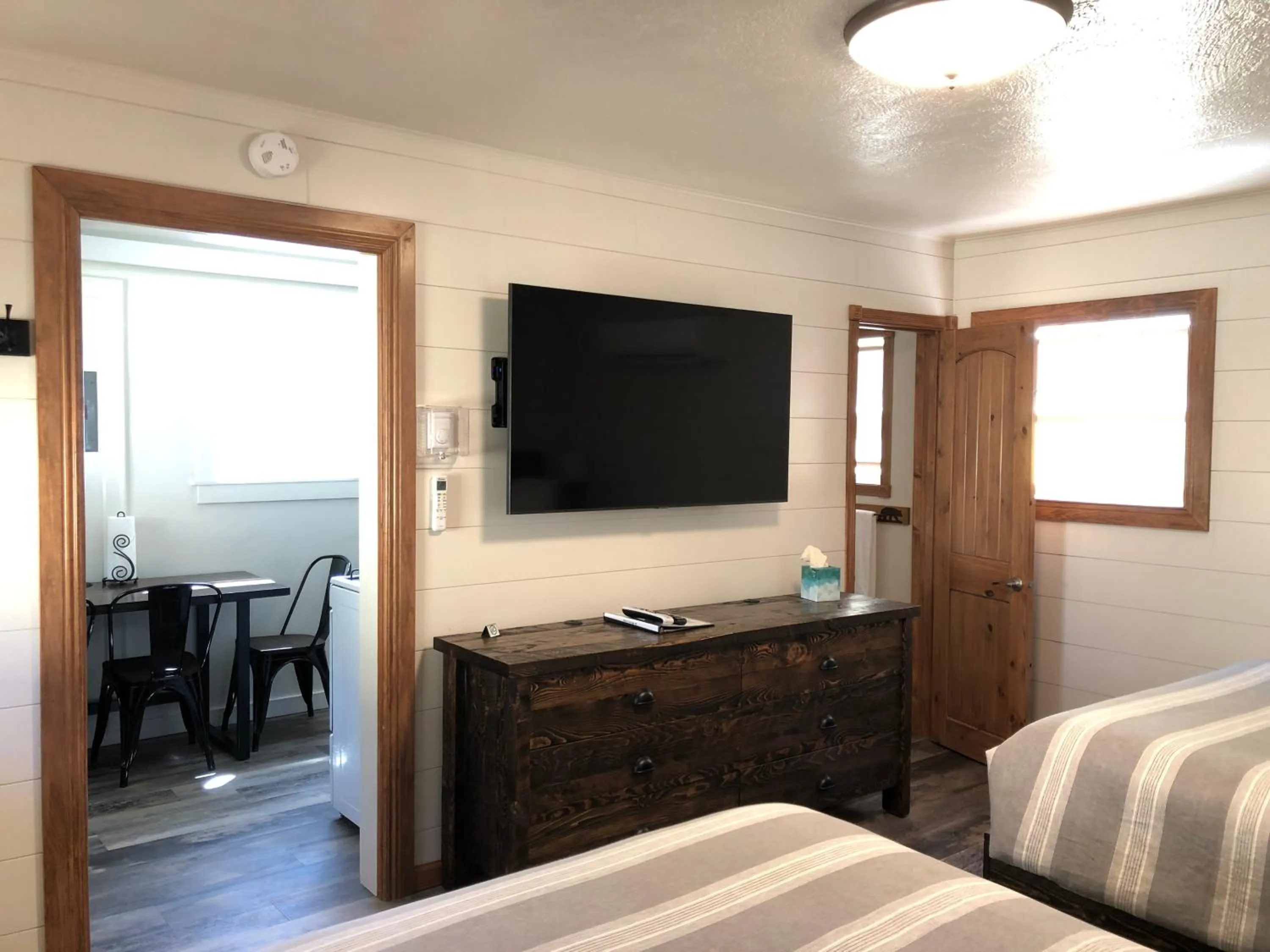 Bed in Yellowstone Riverside Cottages