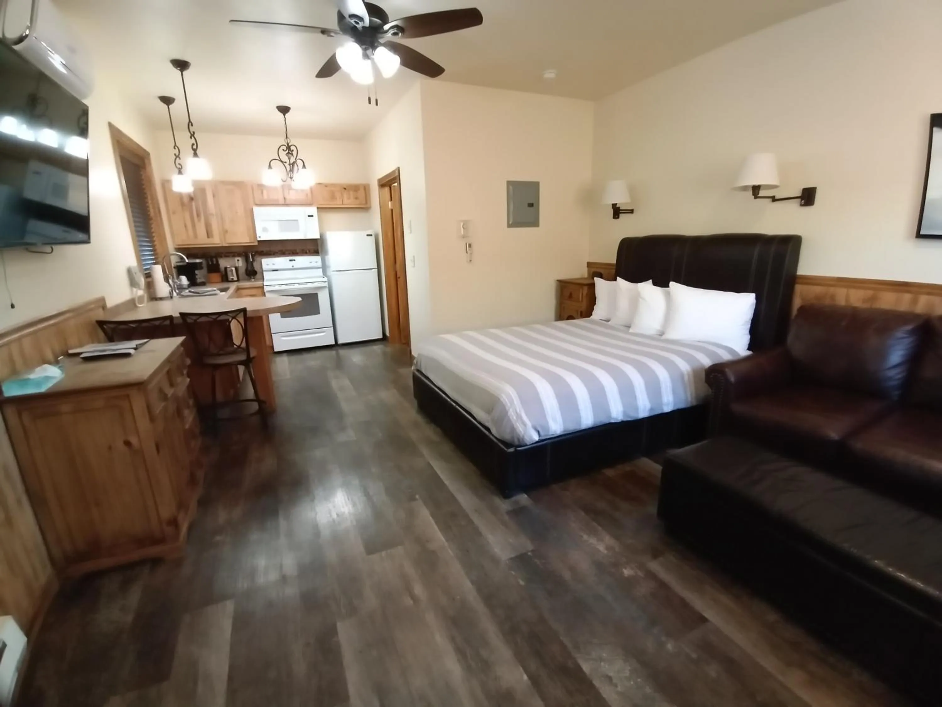 Bed in Yellowstone Riverside Cottages