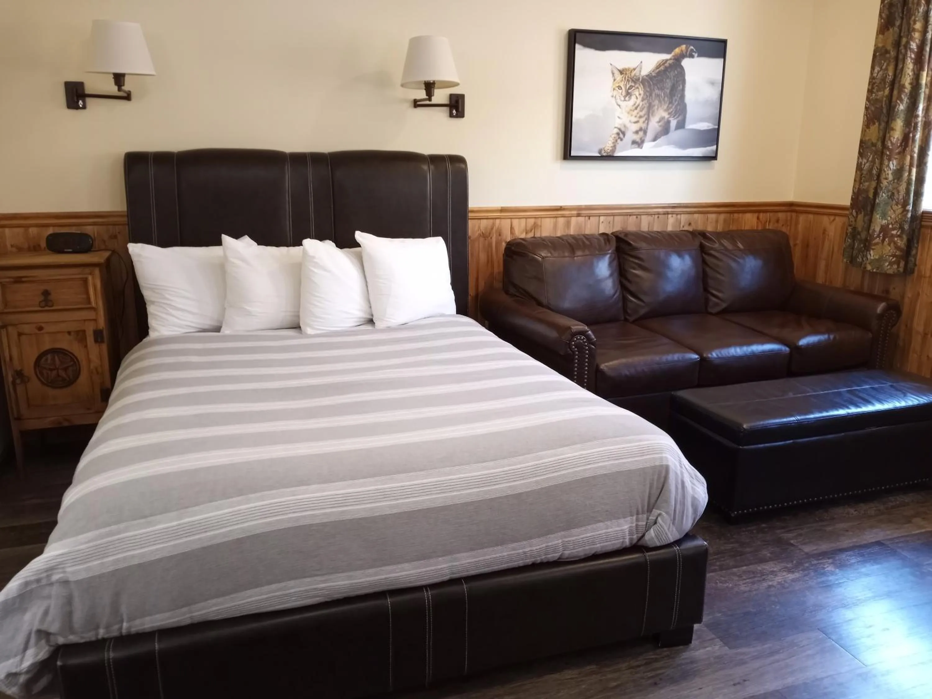 Bed in Yellowstone Riverside Cottages