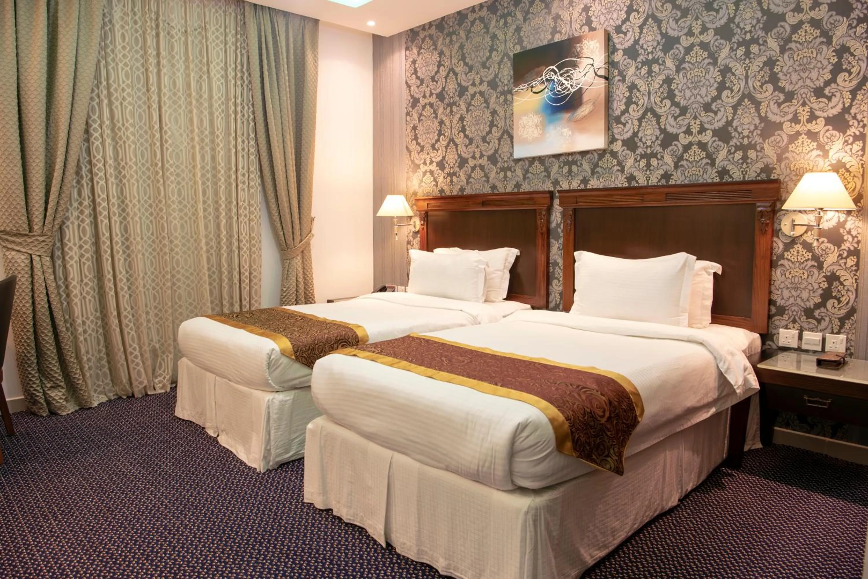 Bed in Jazan Inn Hotel