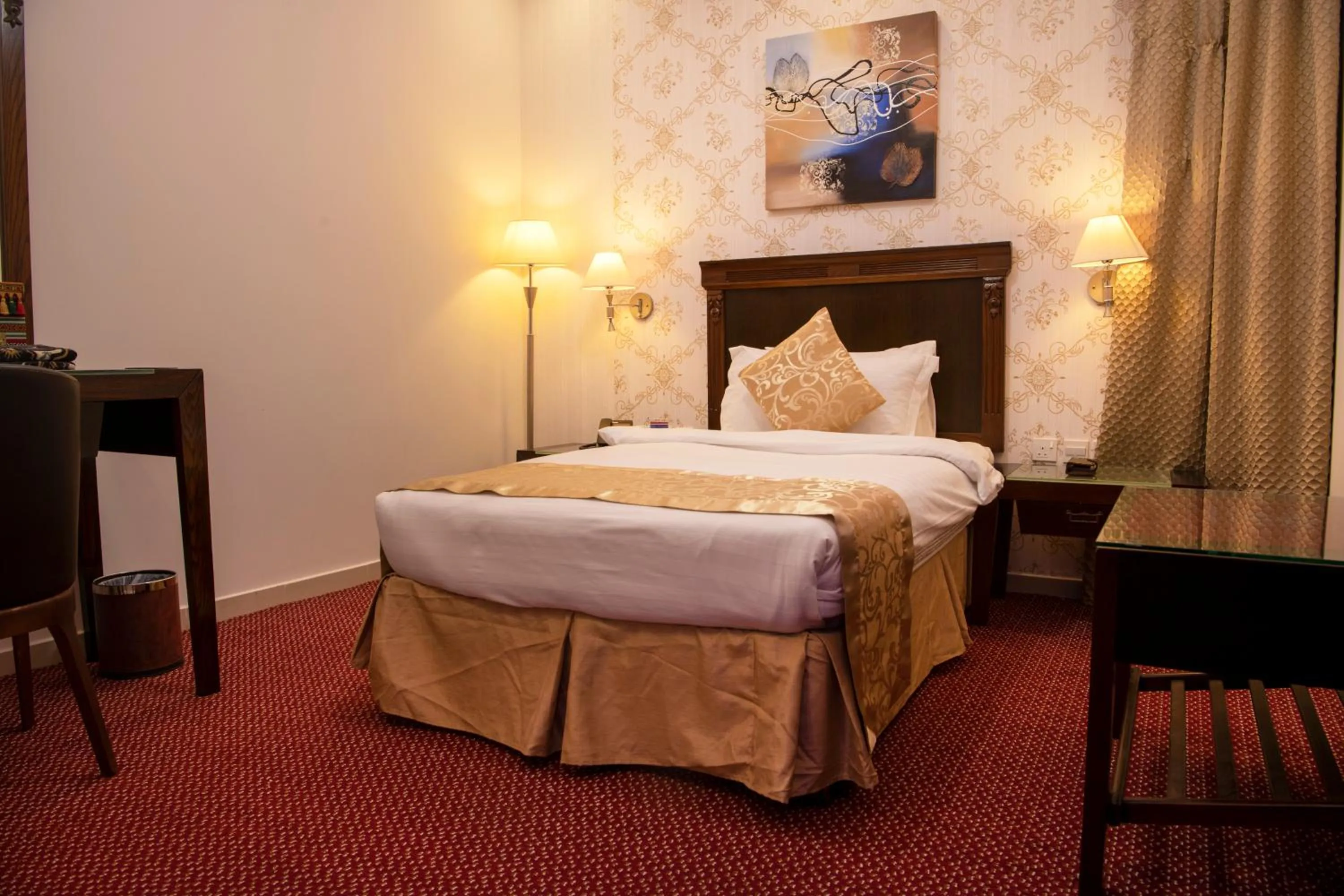 Bed in Jazan Inn Hotel