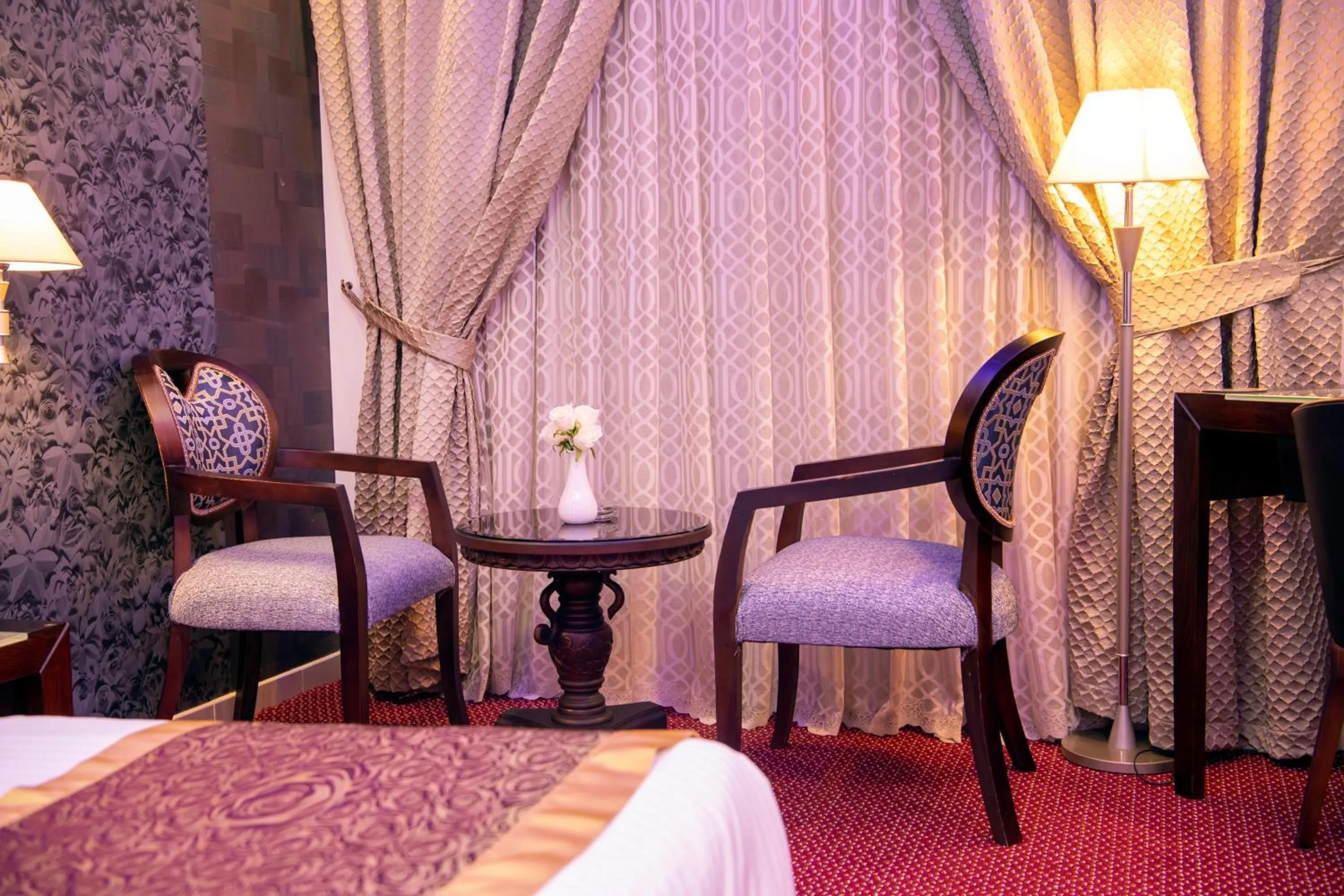 Seating area, Bed in Jazan Inn Hotel