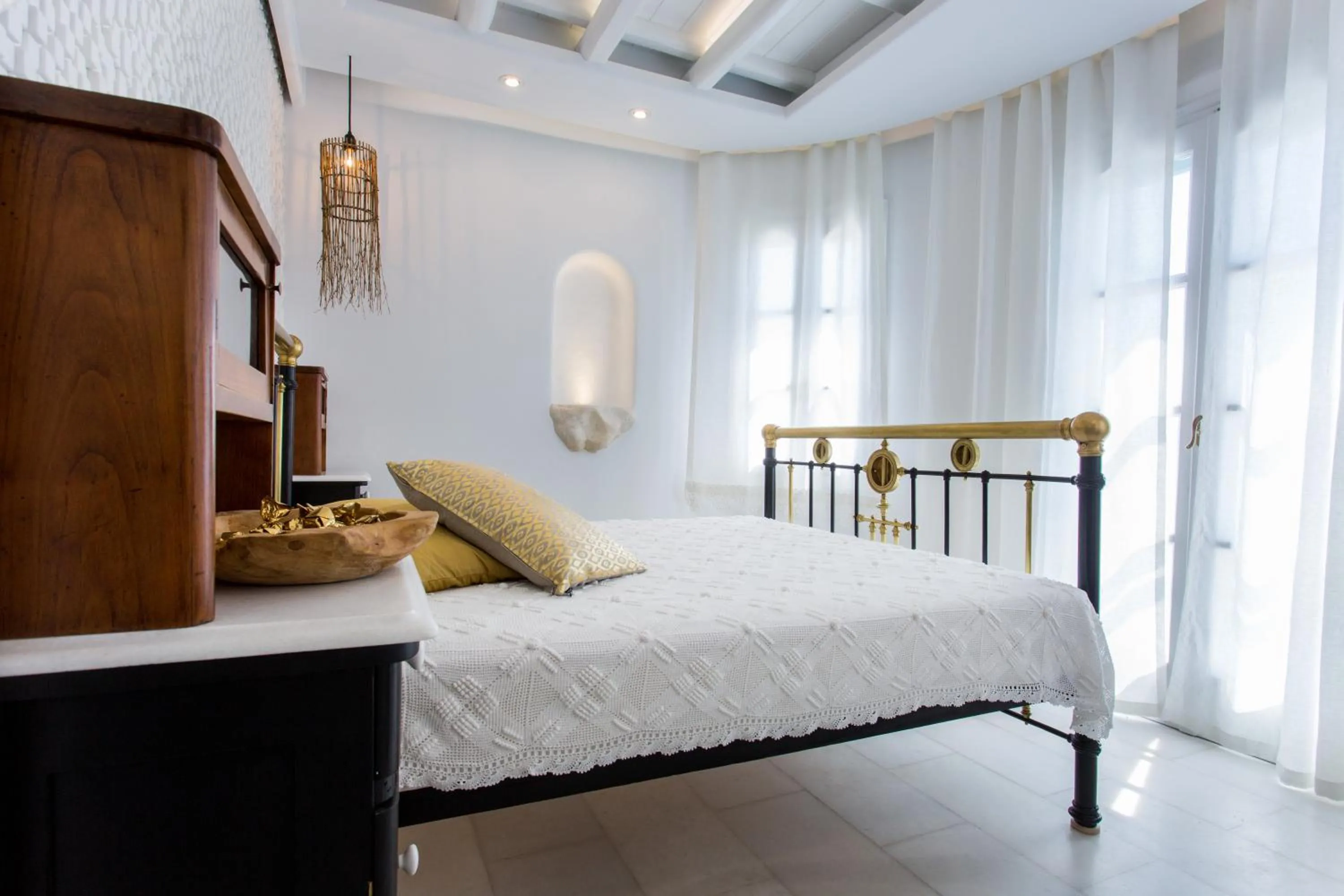 Bed in Naxian Riviera Exclusive Seafront Suites, Junior Suite