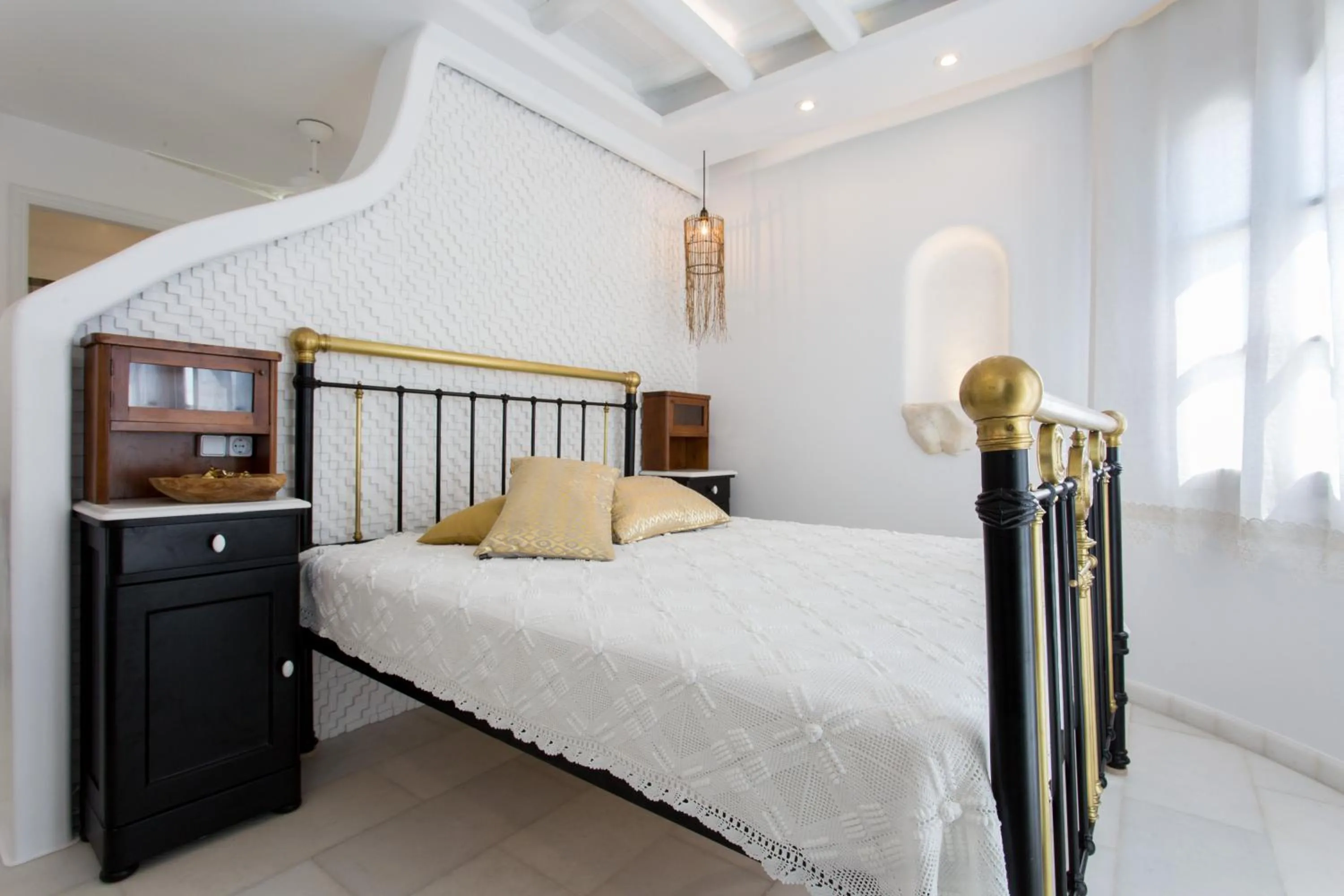 Bed in Naxian Riviera Exclusive Seafront Suites, Junior Suite
