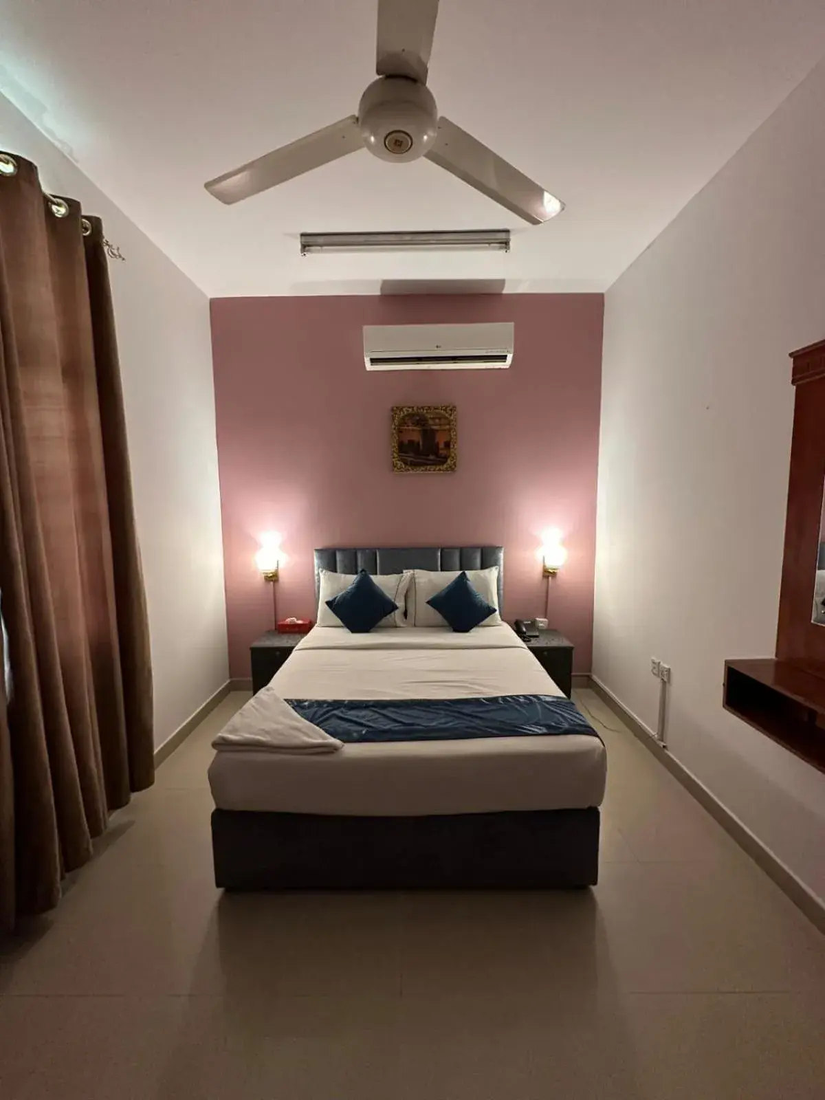 Bed in Savoy Inn Hotel Apartments Bed in Savoy Inn Hotel Apartments