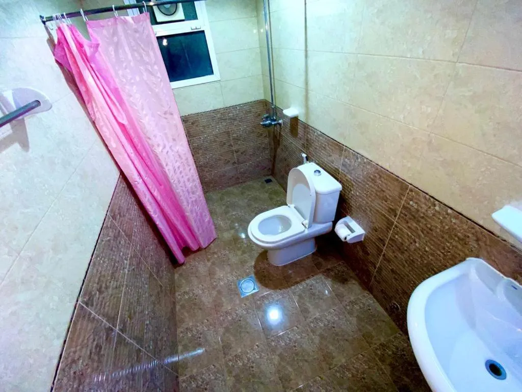 Shower in Savoy Inn Hotel Apartments