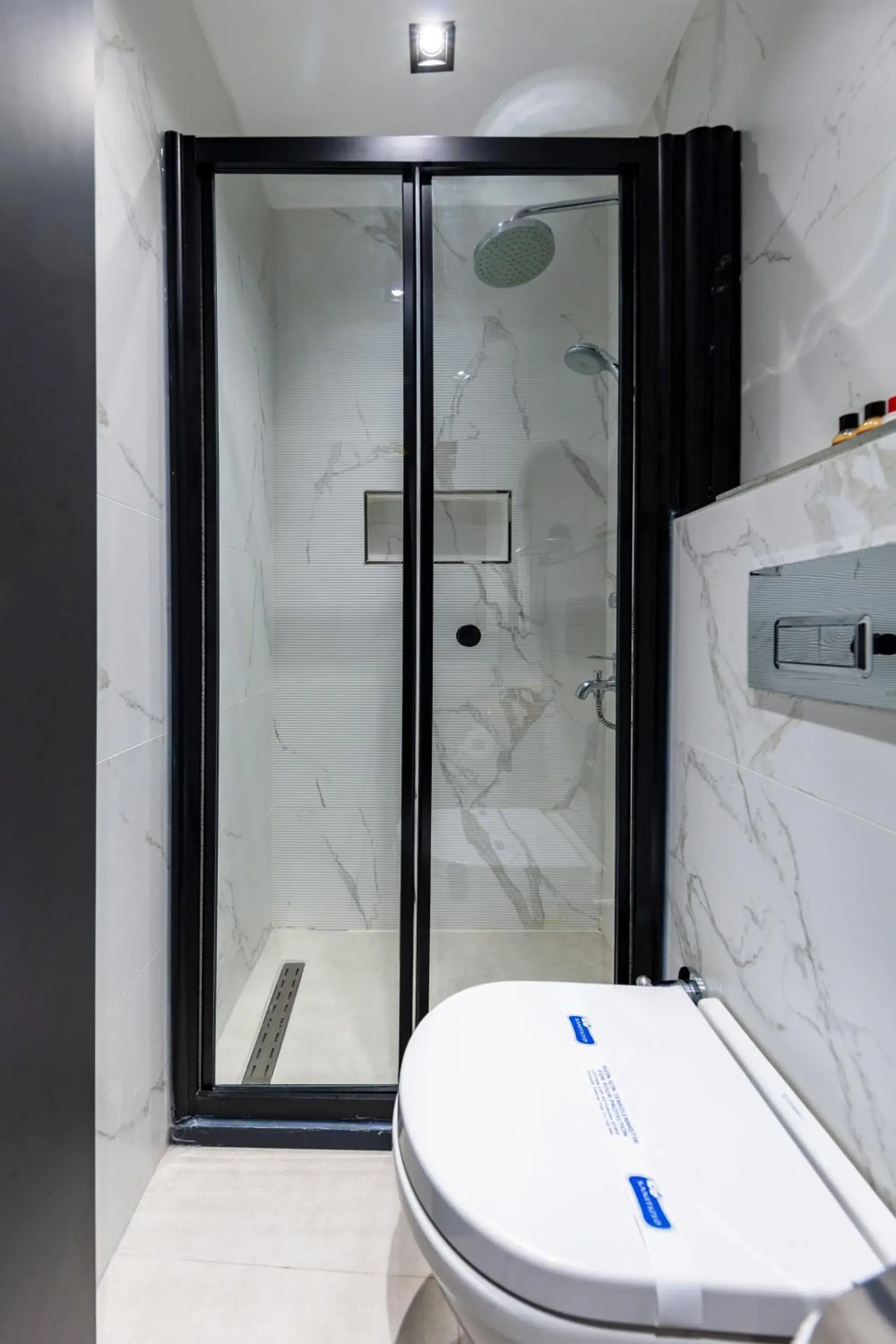 Shower in Taksim Avenue Shower in Taksim Avenue