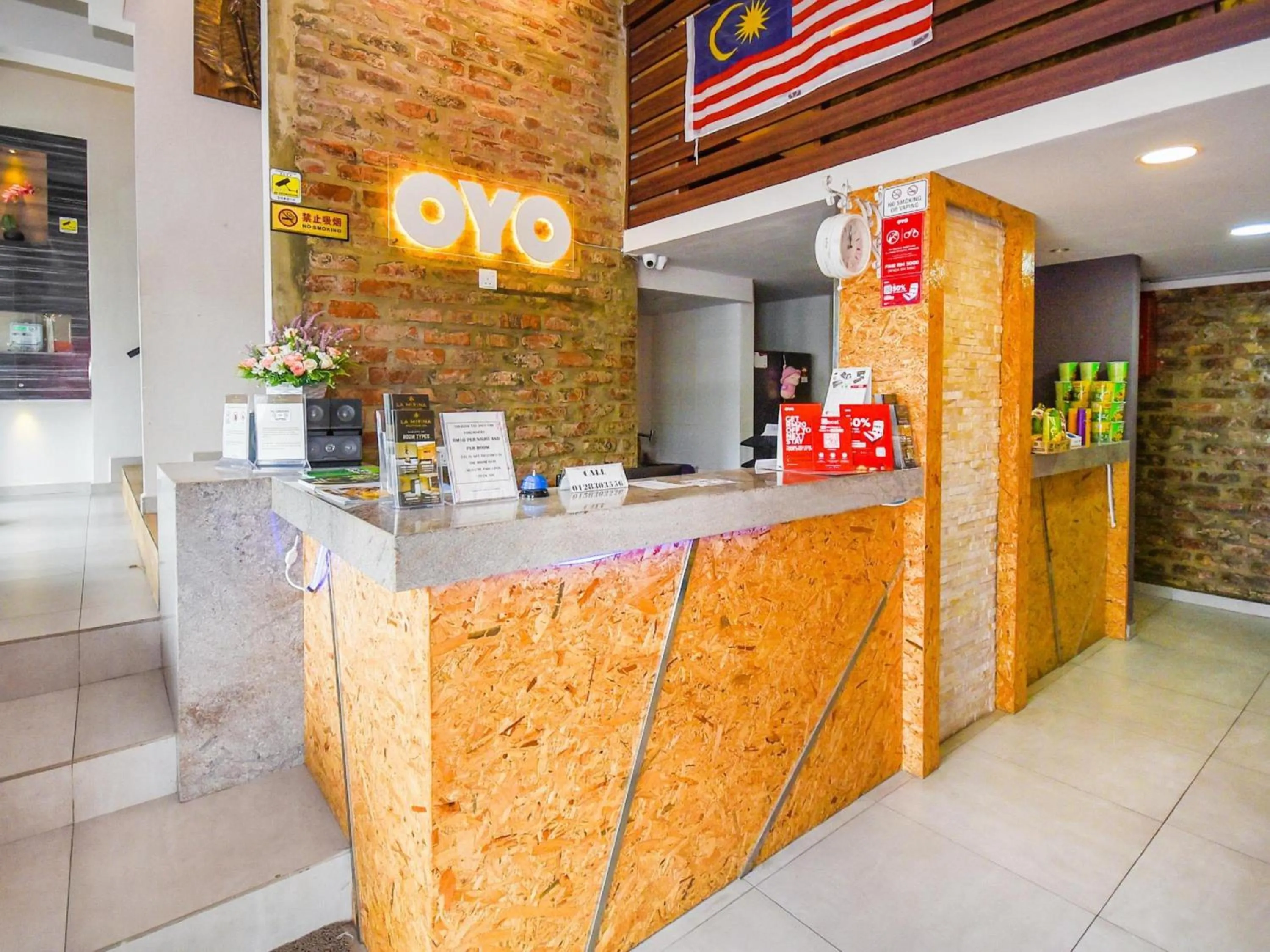 Lobby or reception in Hotel O La Mirina Boutique Inn