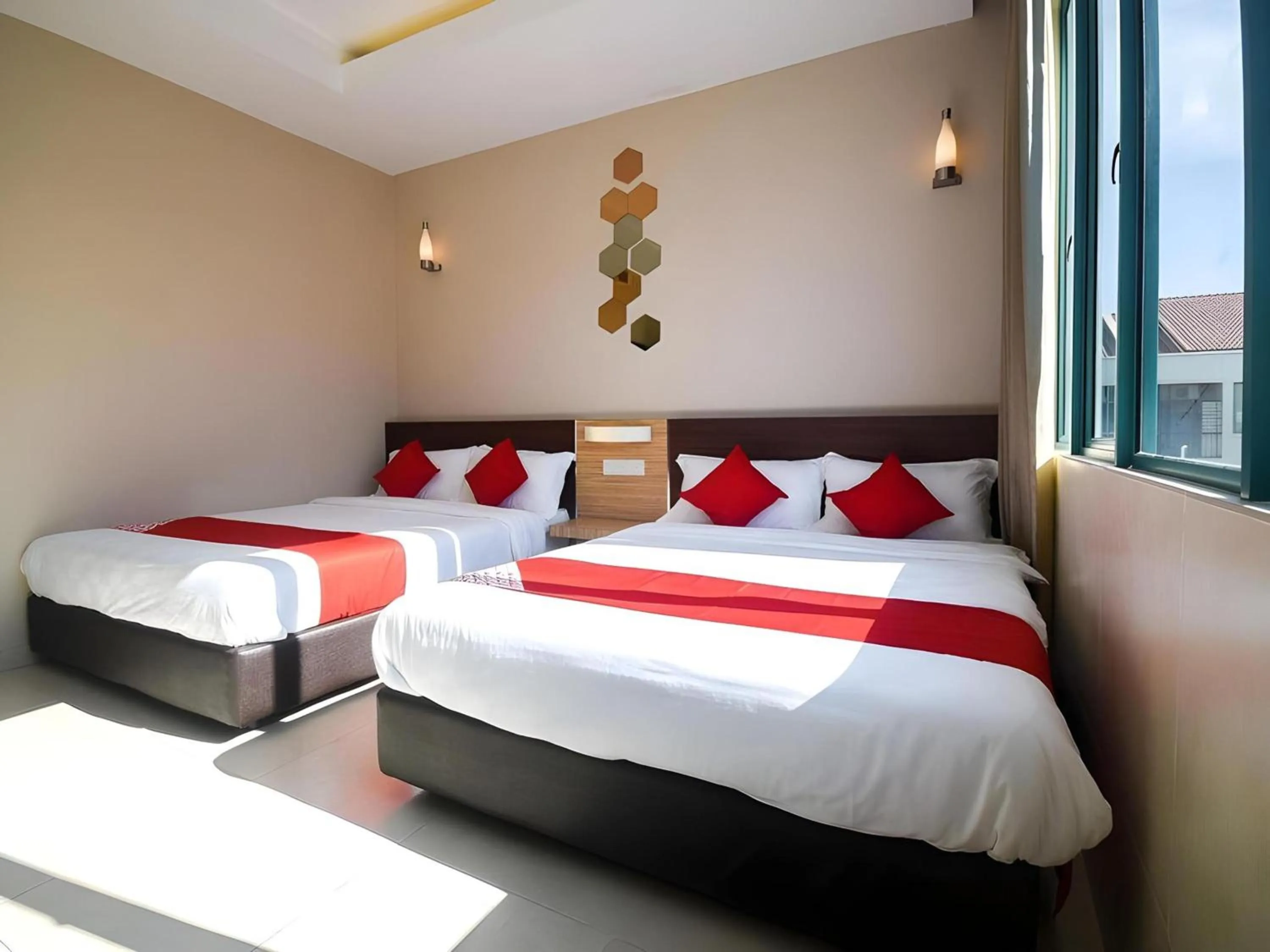 Photo of the whole room, Bed in Hotel O La Mirina Boutique Inn