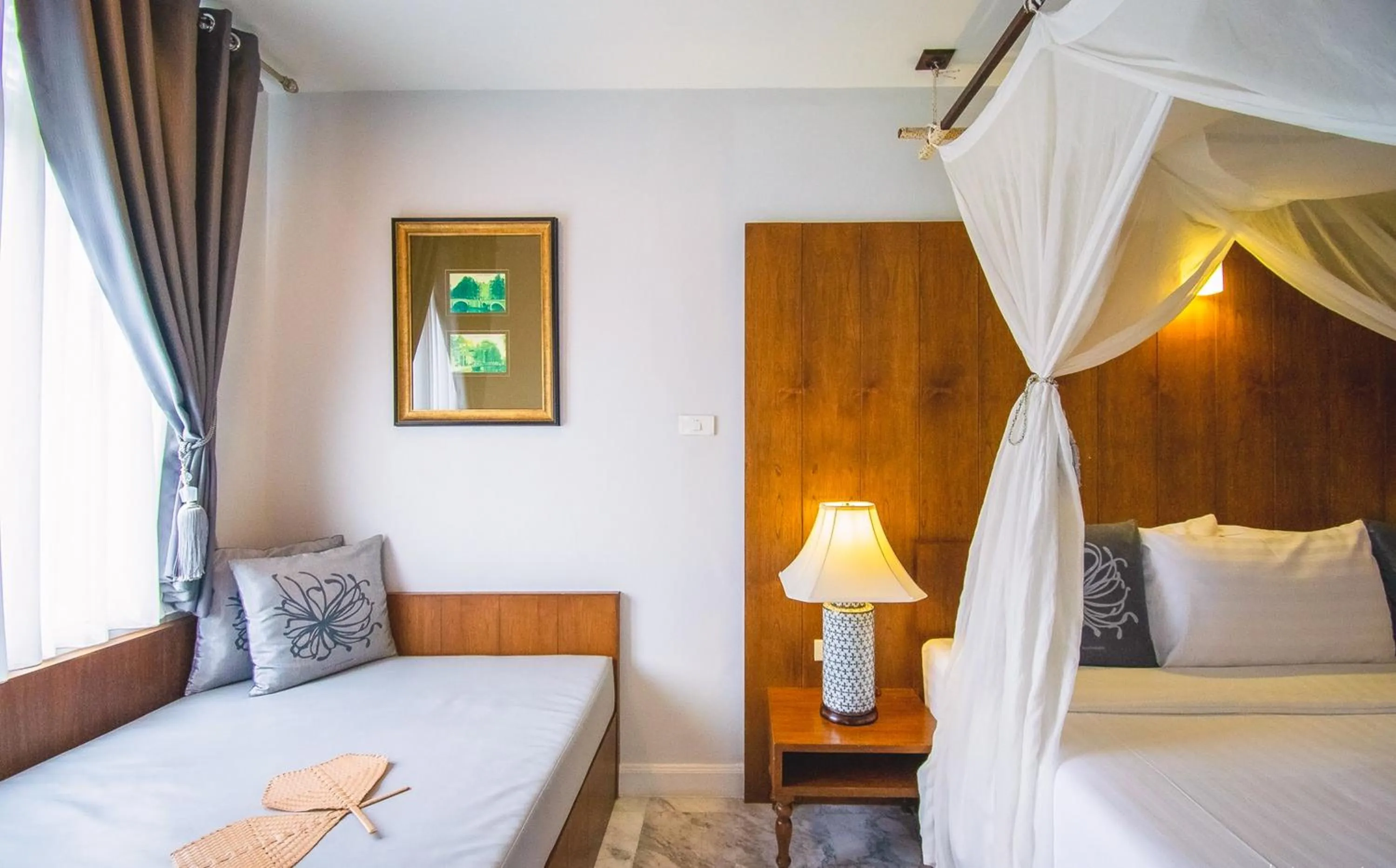 Seating area, Bed in Villa Amphawa