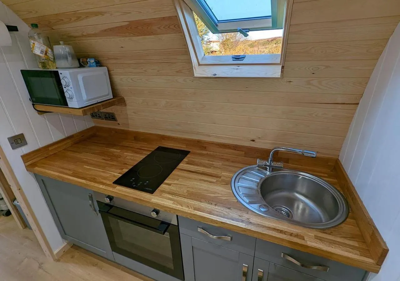 Kitchen or kitchenette in Great Hallingbury Manor & Lodges London Stansted