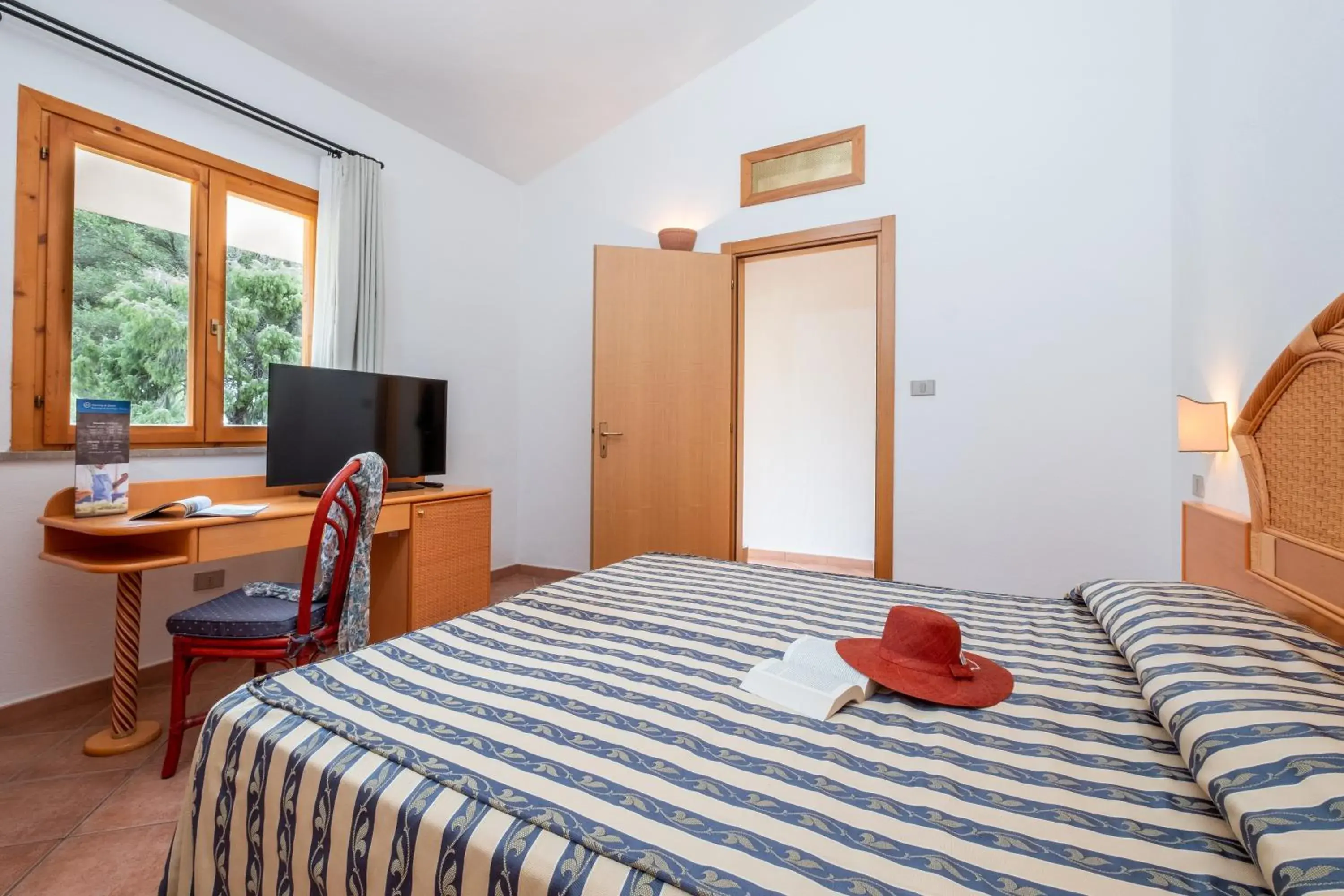 Bed in TH Marina di Sibari - Baia Degli Achei Village Bed in TH Marina di Sibari - Baia Degli Achei Village