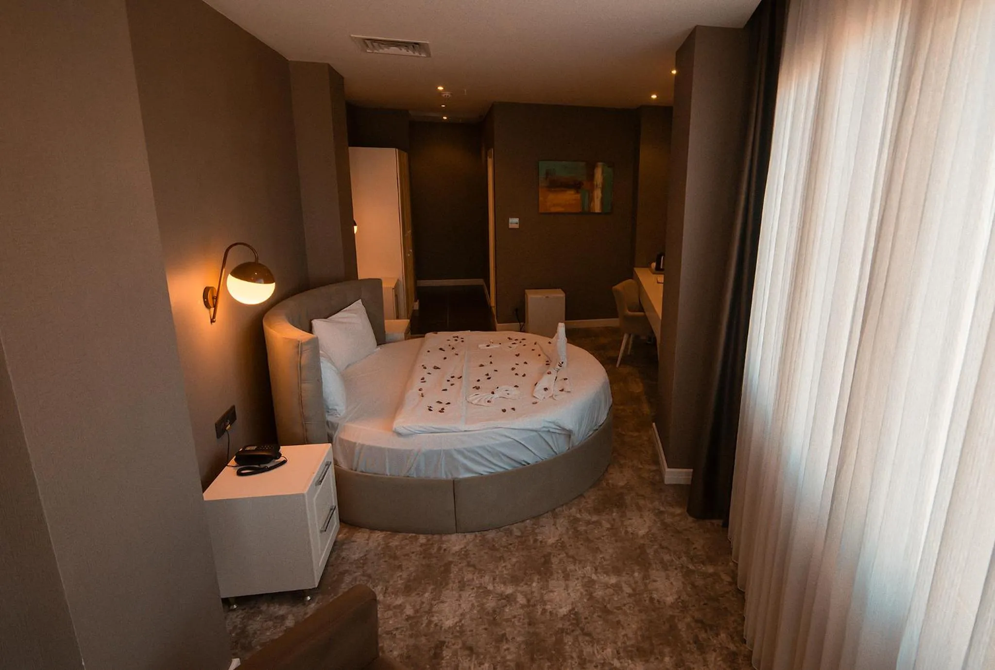 Bed in Royal Comfort Hotel