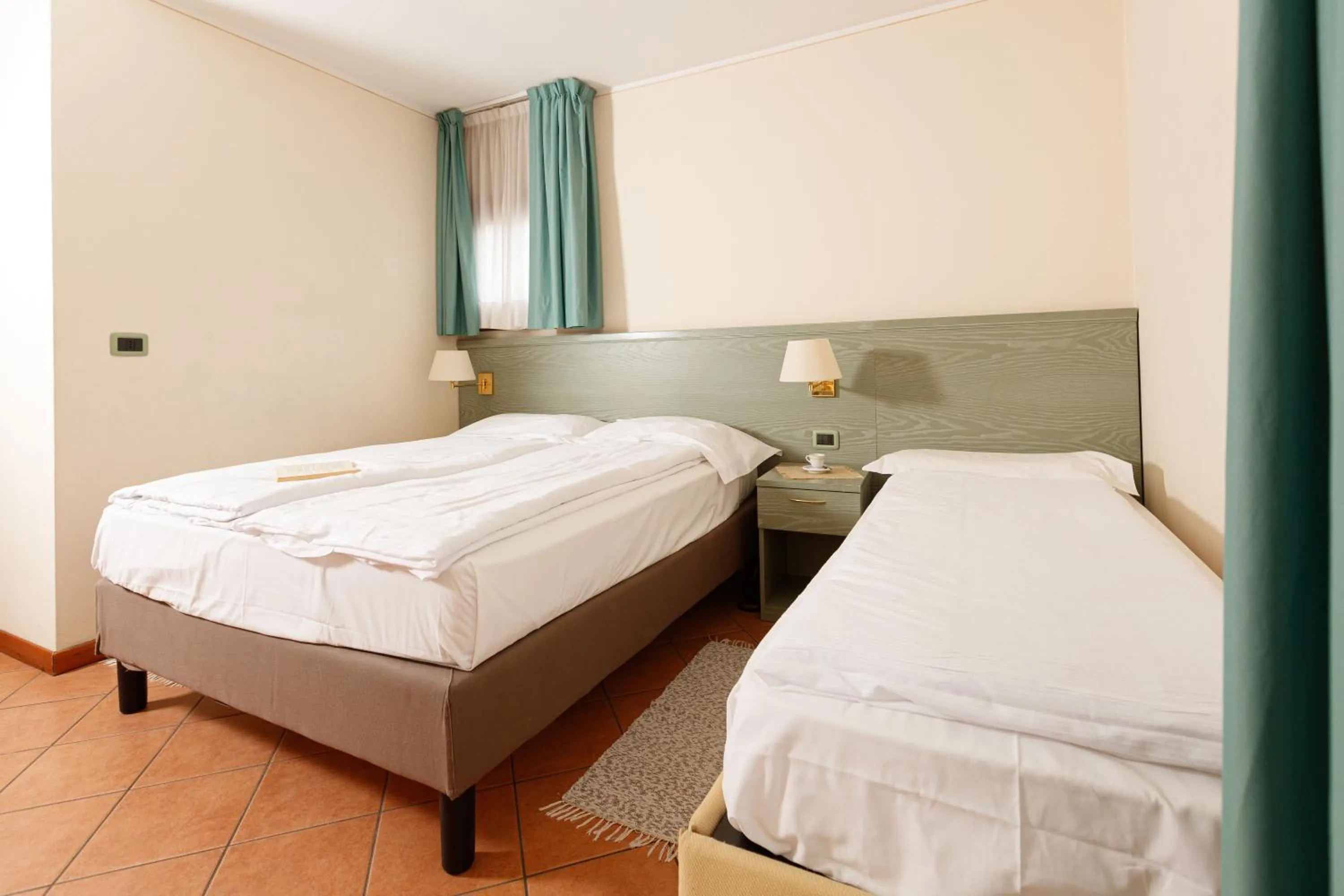 Bed in Hotel Villa Rina