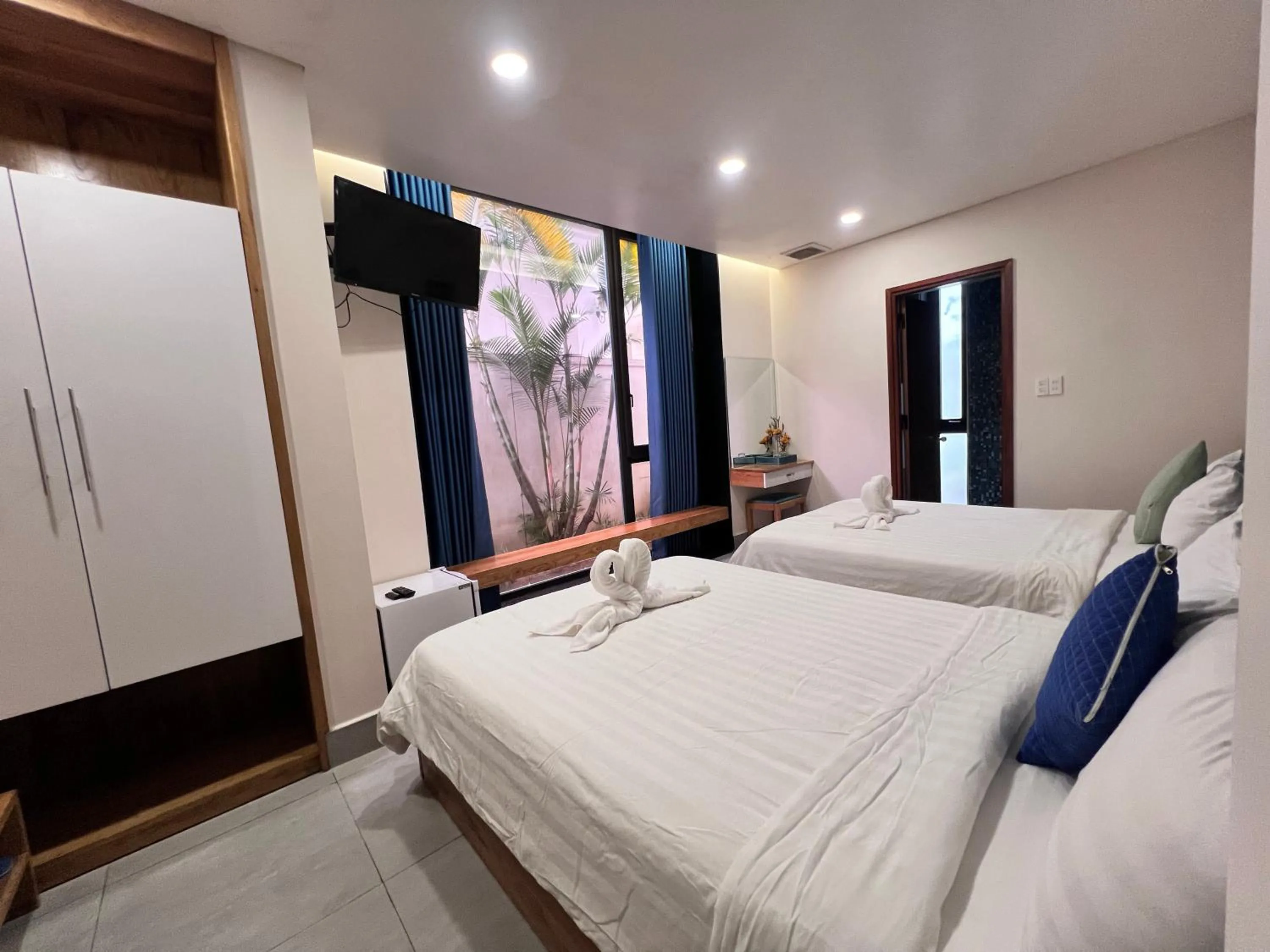 Bed in TTR Rin Villa & Hotel