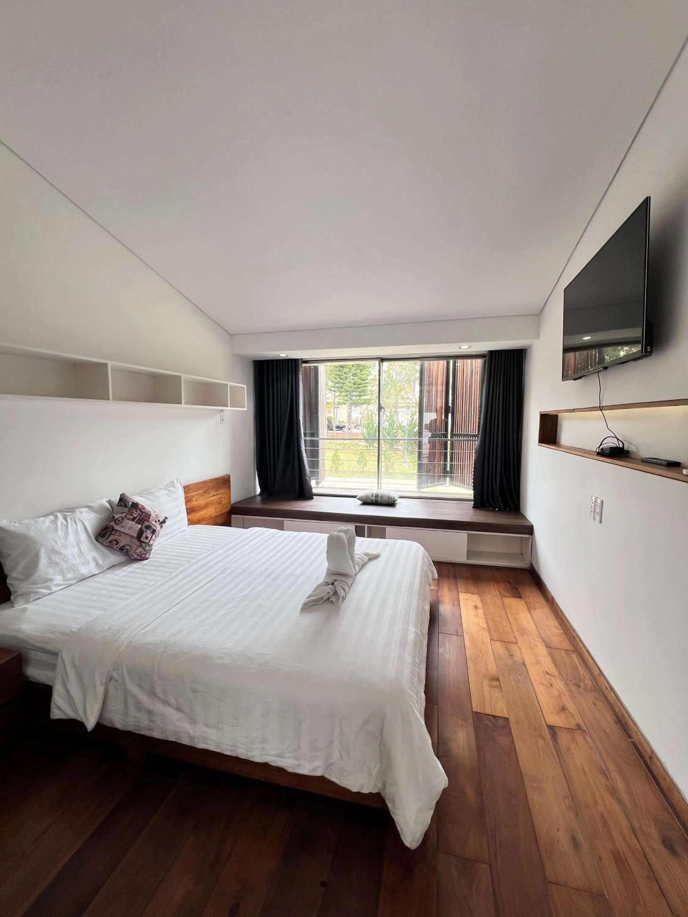 Bed in TTR Rin Villa & Hotel