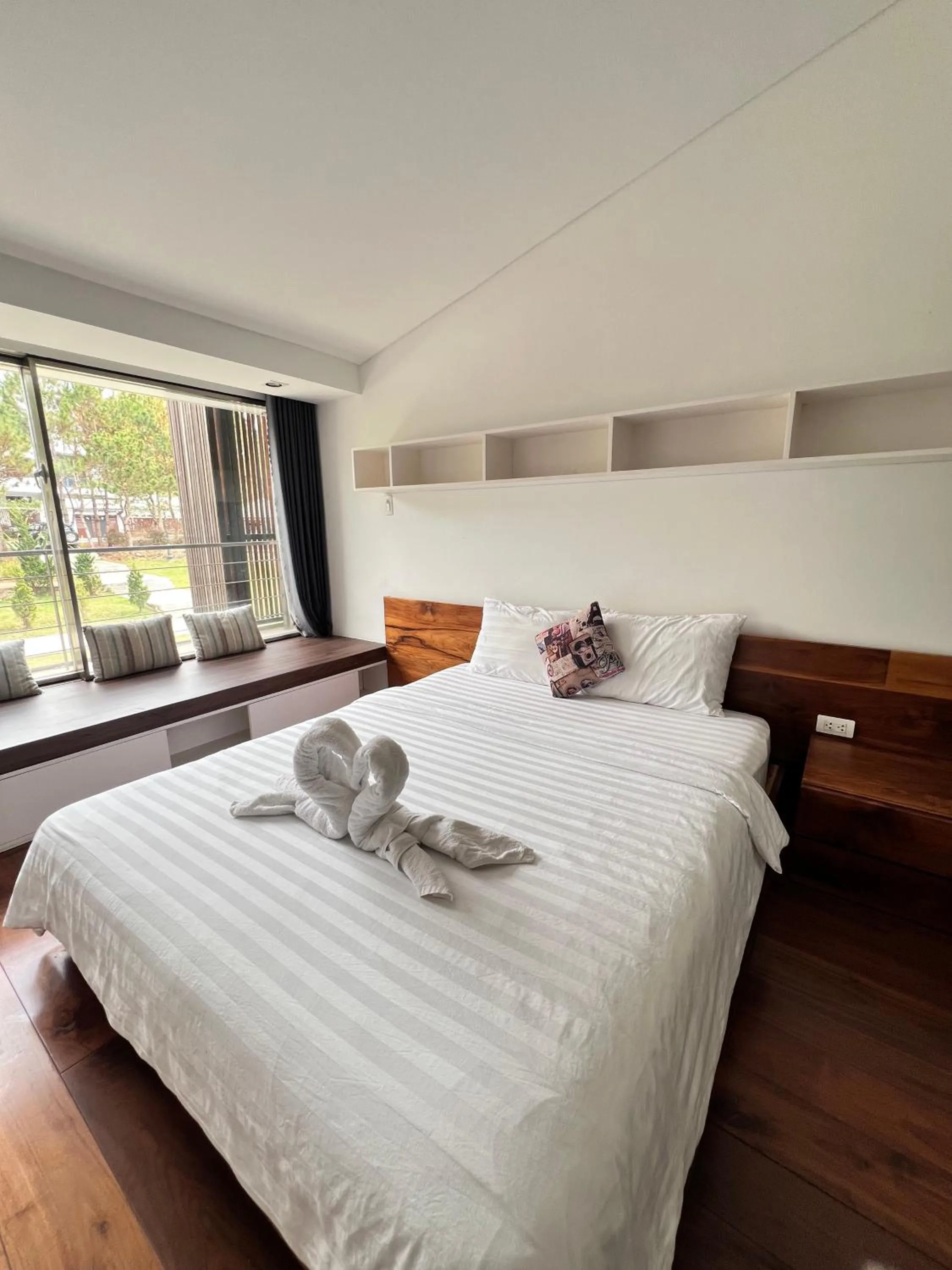Bed in TTR Rin Villa & Hotel