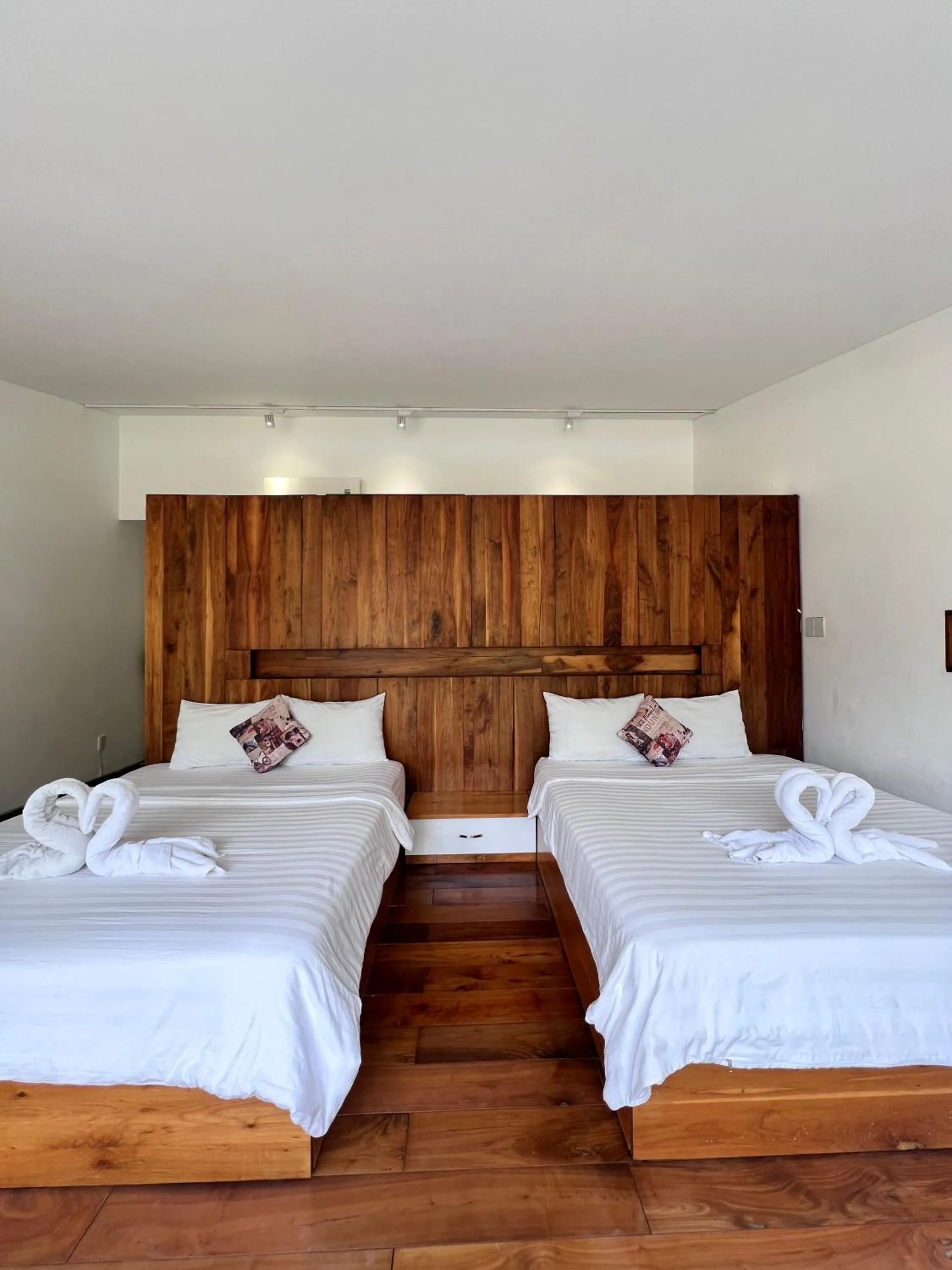 Bed in TTR Rin Villa & Hotel