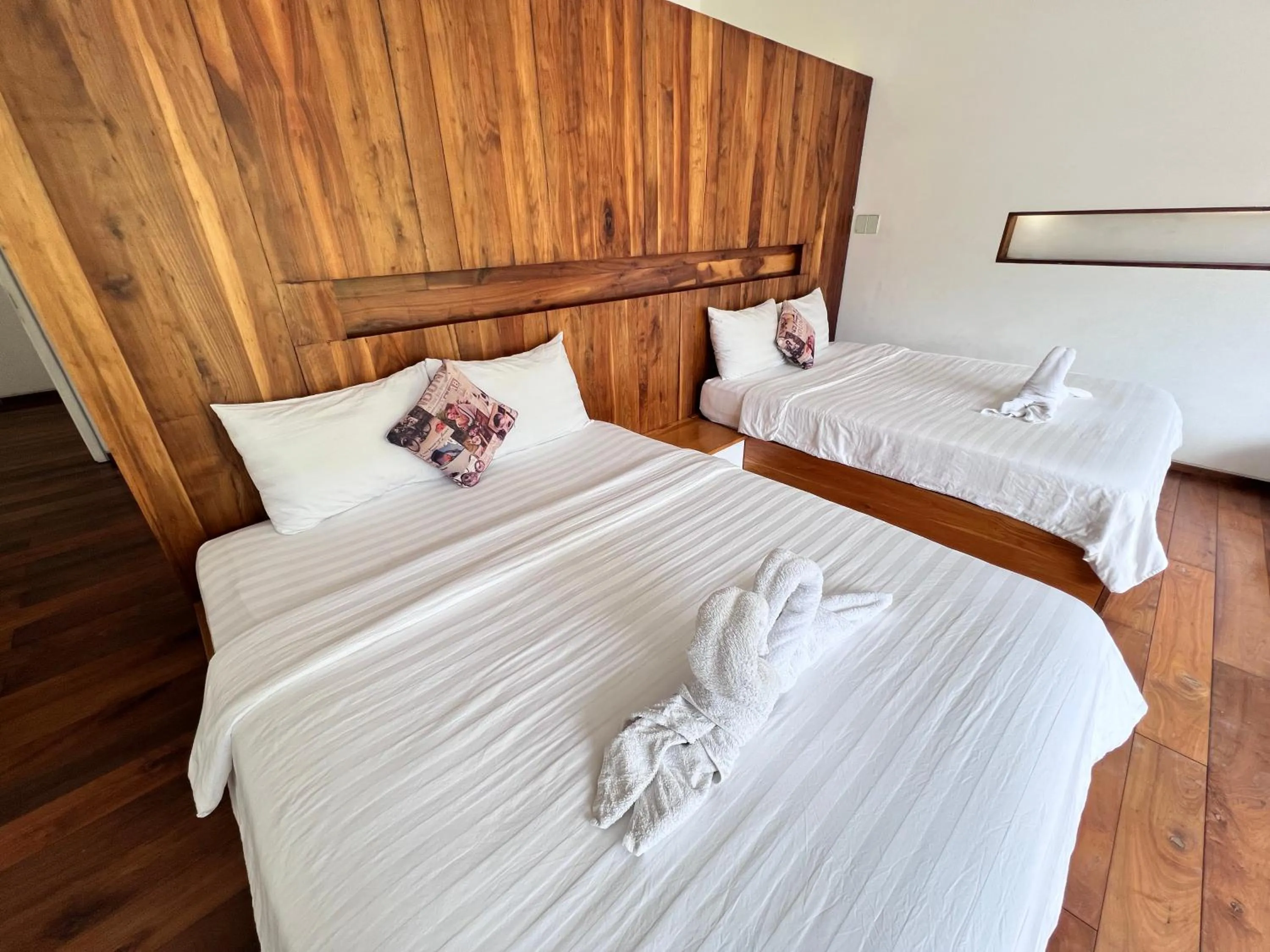 Bed in TTR Rin Villa & Hotel