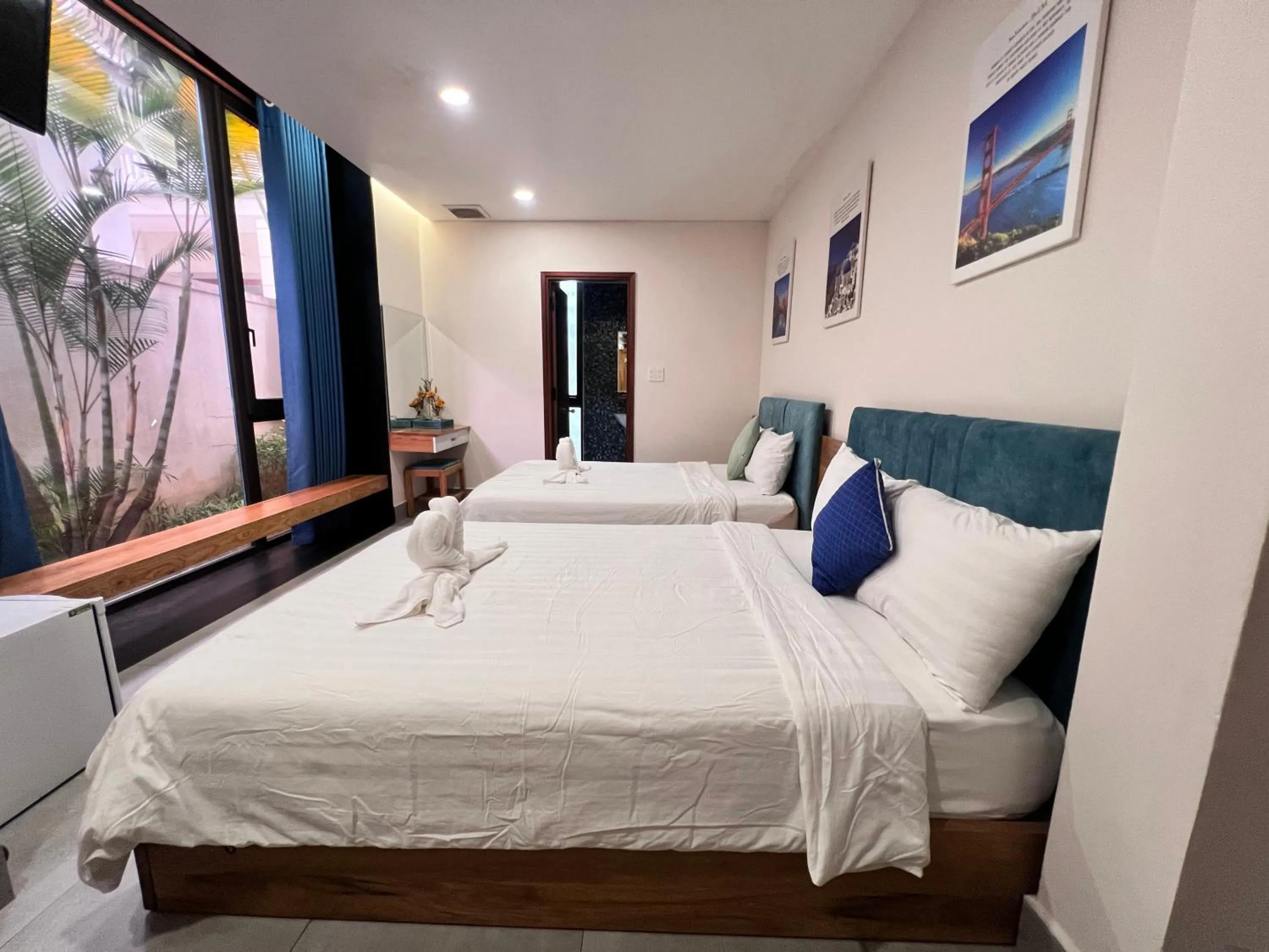 Bed in TTR Rin Villa & Hotel
