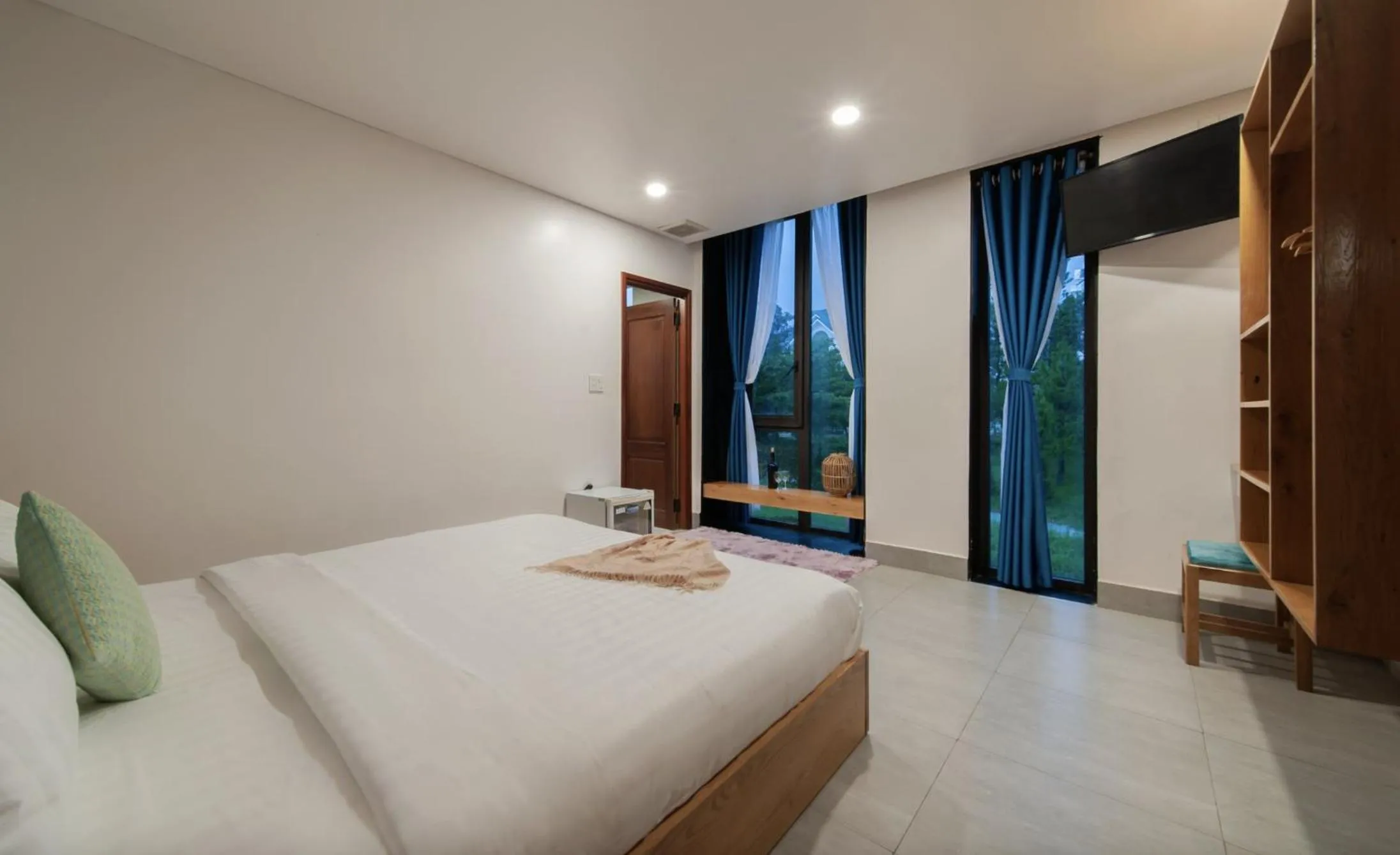 Bed in TTR Rin Villa & Hotel