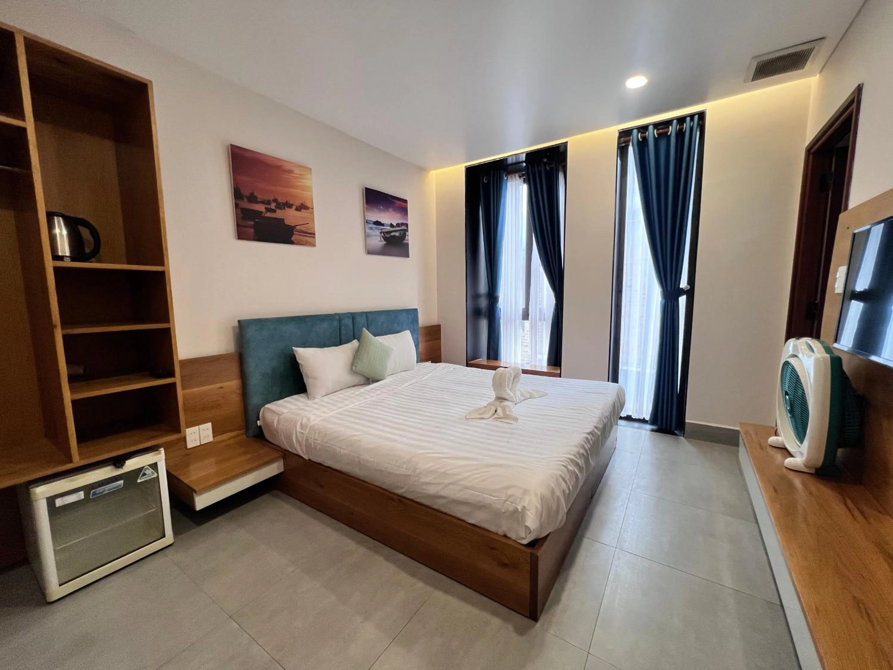 Bed in TTR Rin Villa & Hotel