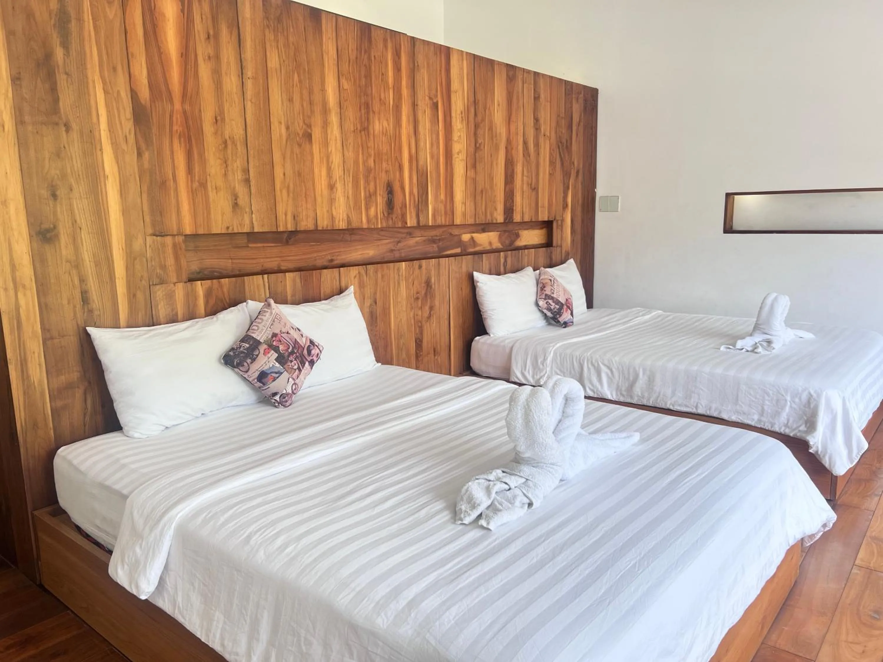 Bed in TTR Rin Villa & Hotel