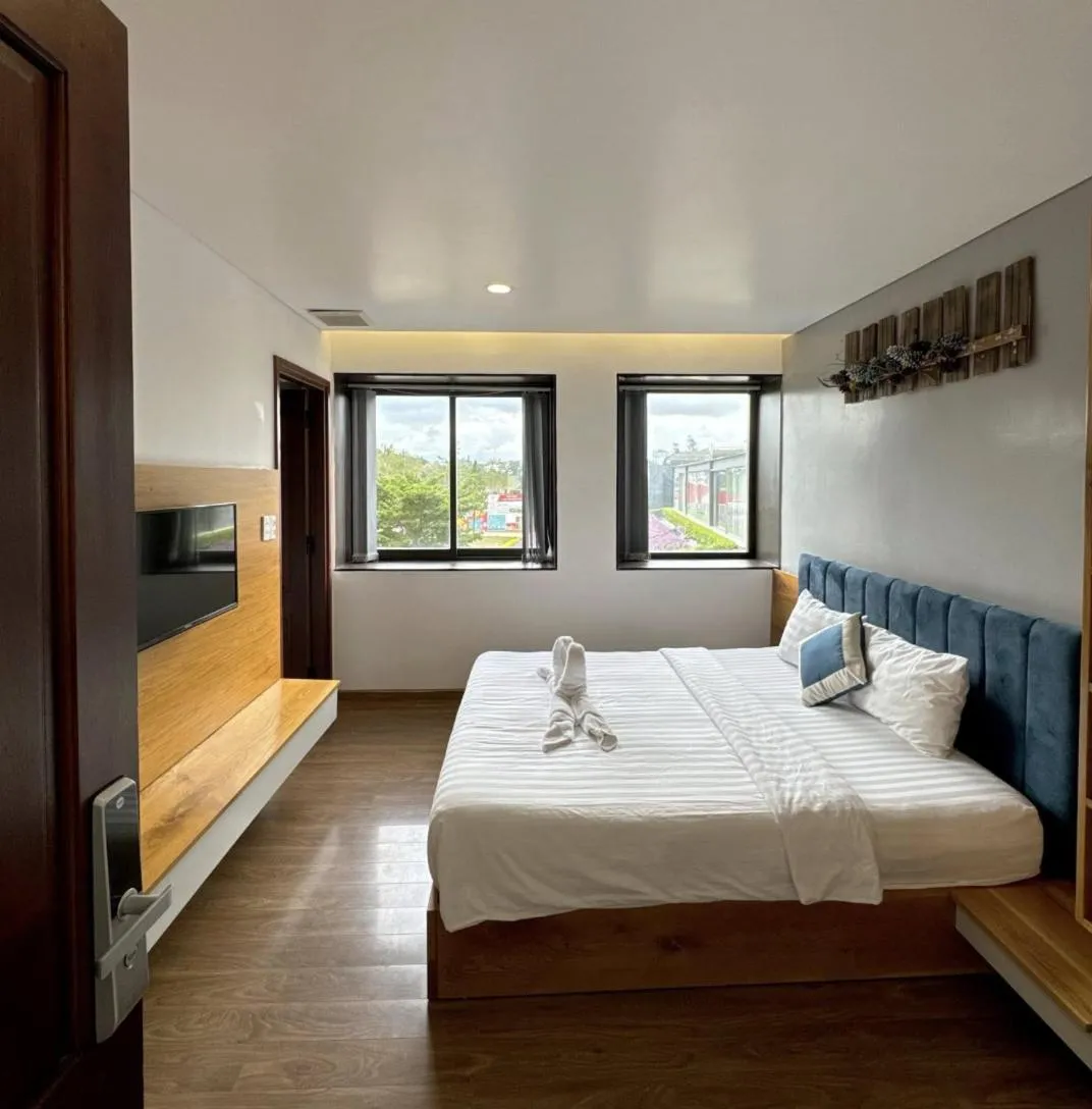 Bed in TTR Rin Villa & Hotel