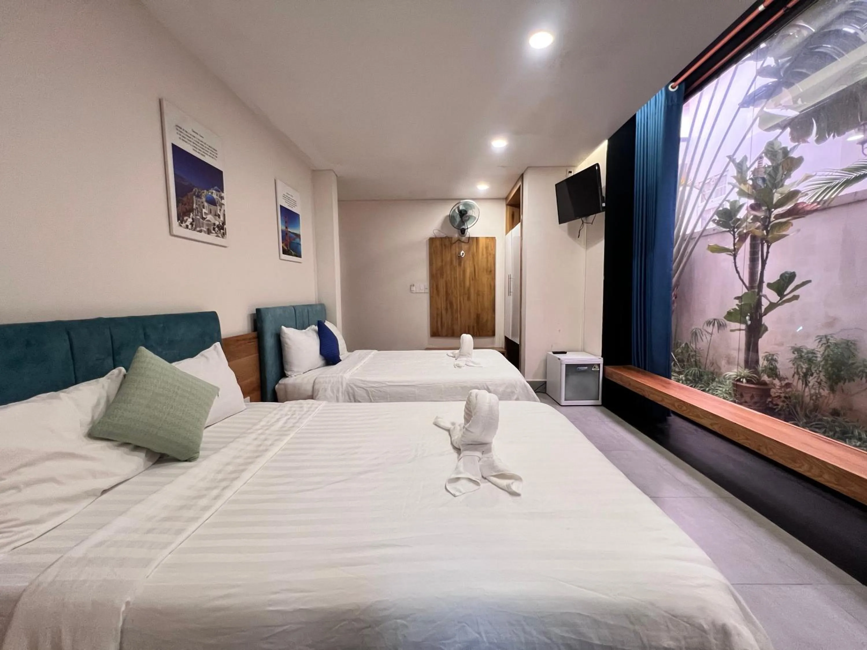 Bed in TTR Rin Villa & Hotel