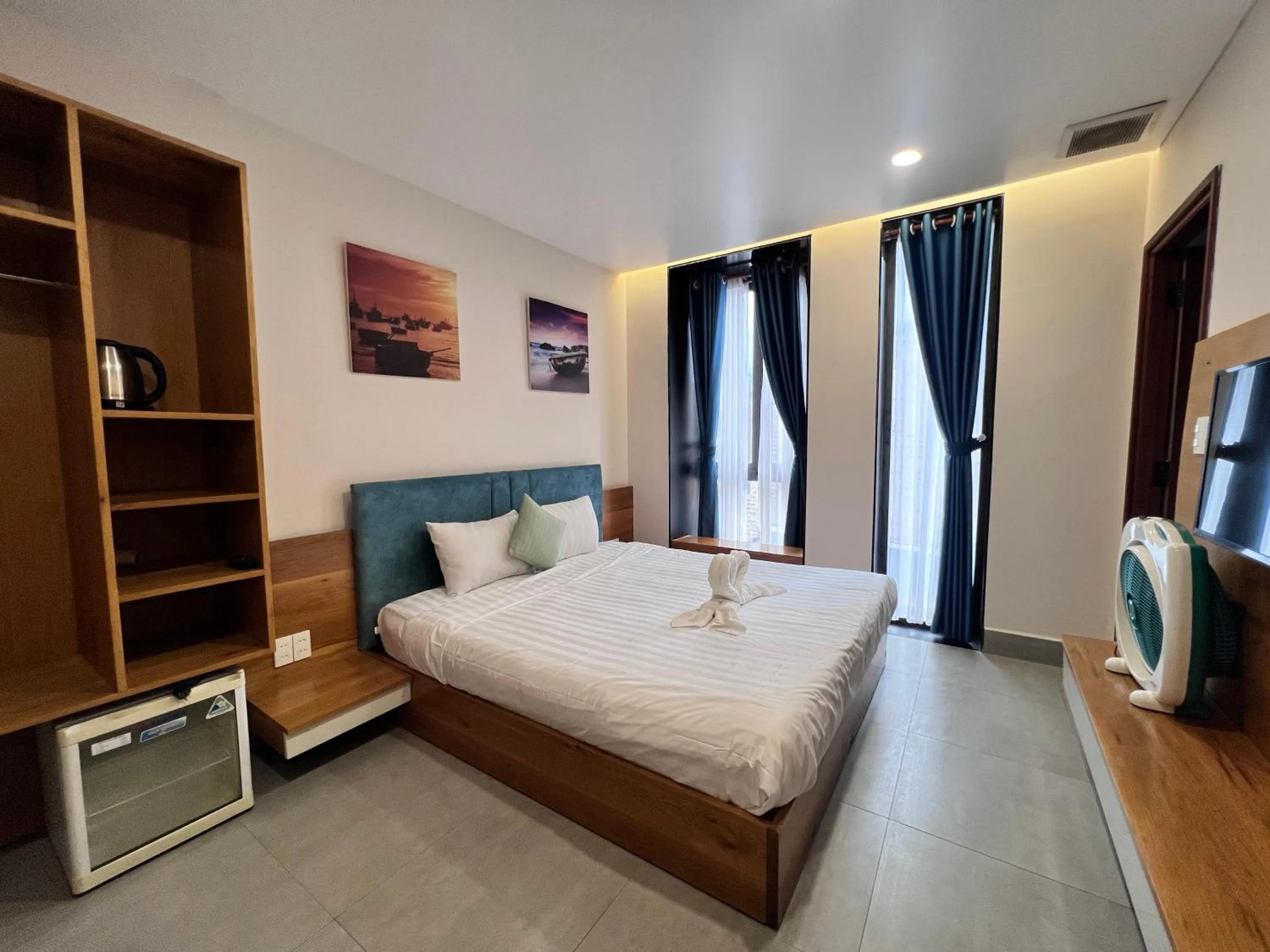 Bed in TTR Rin Villa & Hotel