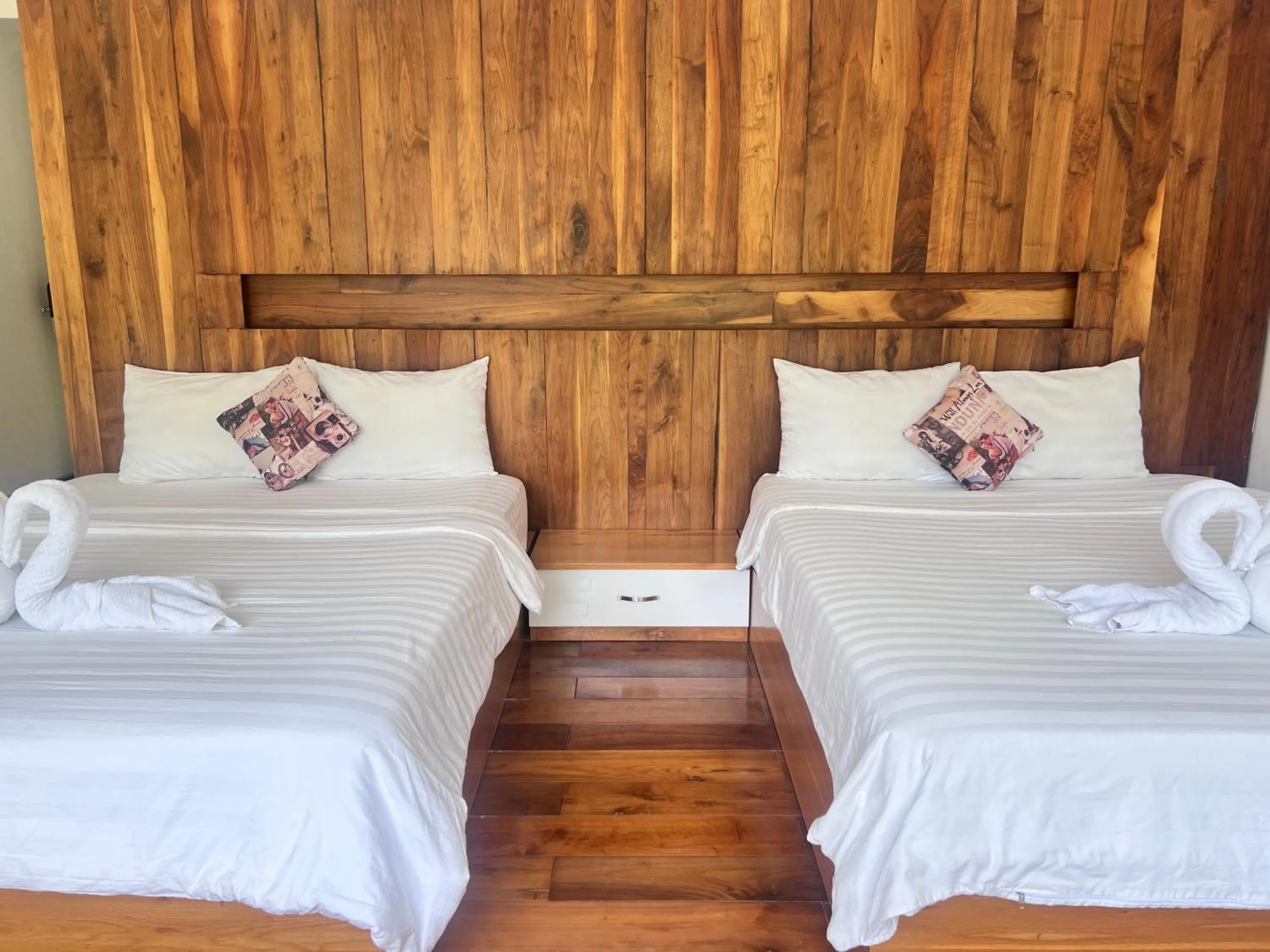 Bed in TTR Rin Villa & Hotel