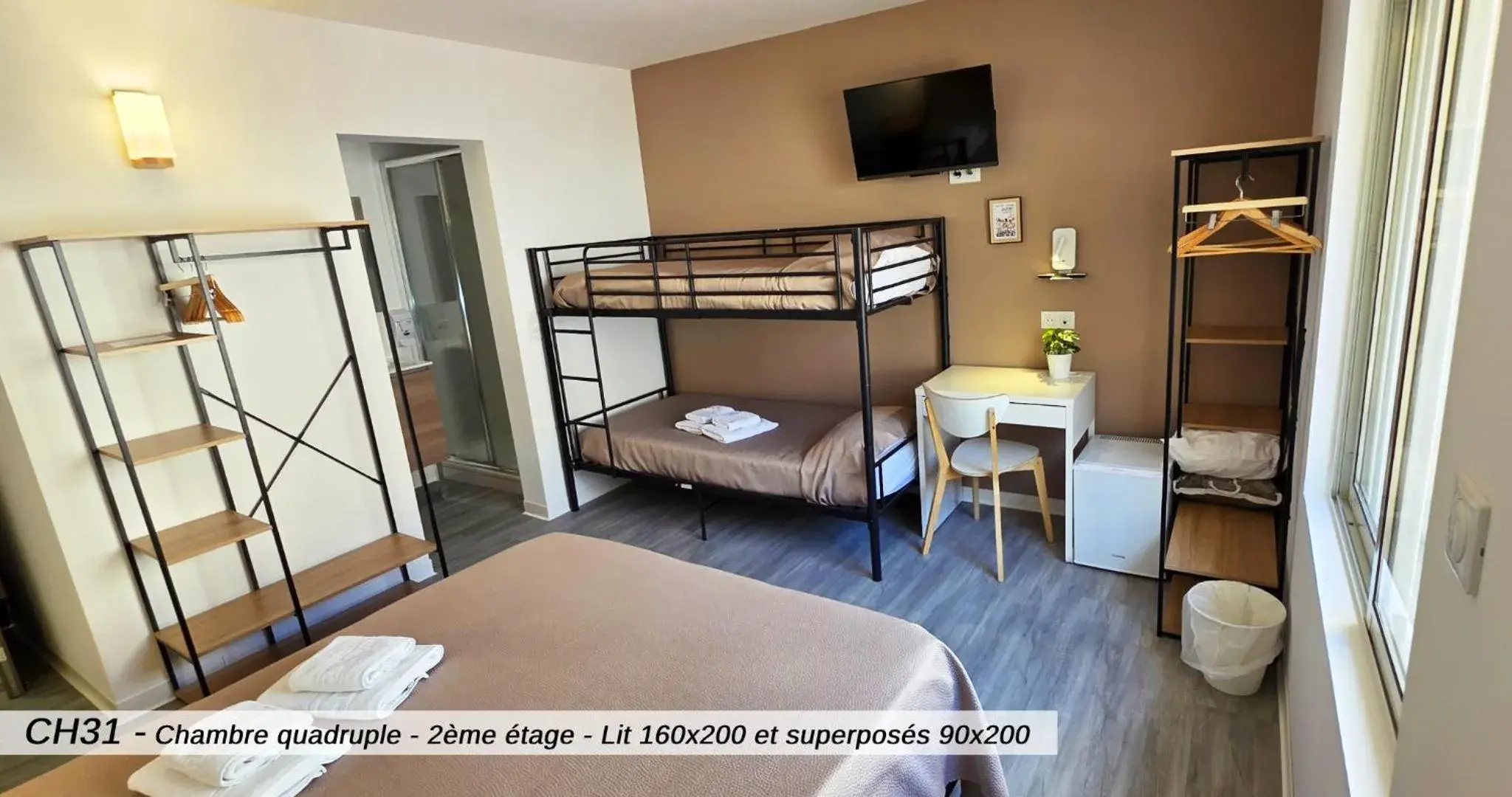 Quadruple Room in Hôtel Au Valéry Quadruple Room in Hôtel Au Valéry