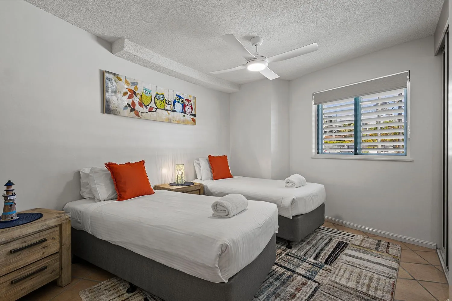 Bed in Grand Palais Boolarong Beachside Apartments