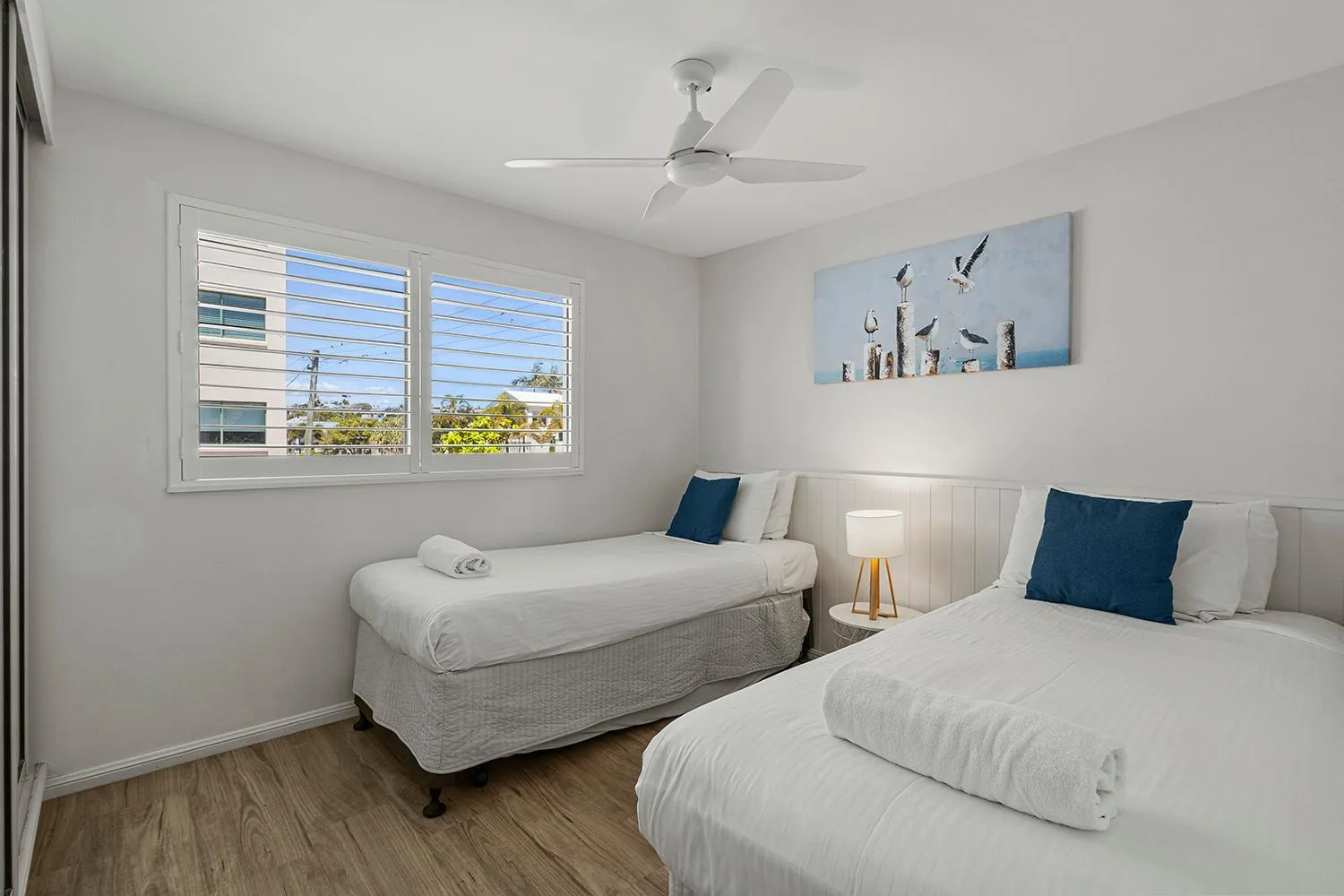 Bed in Grand Palais Boolarong Beachside Apartments