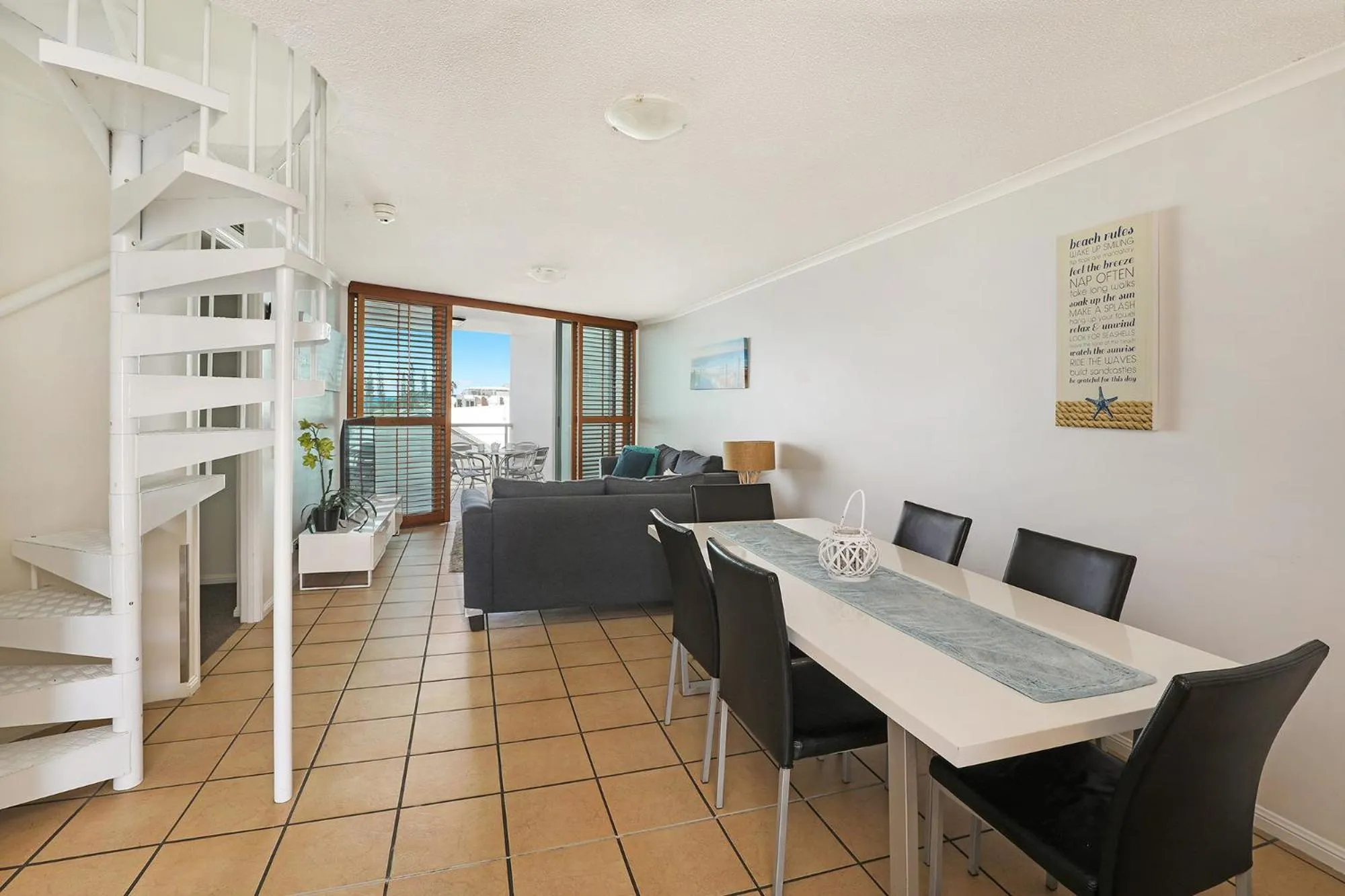 Seating area in Grand Palais Boolarong Beachside Apartments