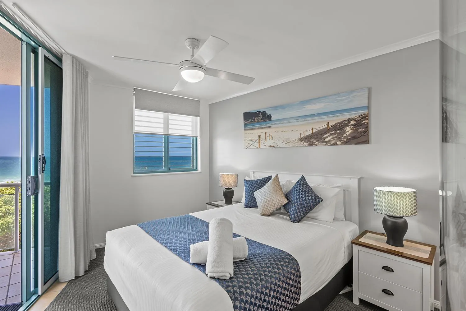 Bed in Grand Palais Boolarong Beachside Apartments