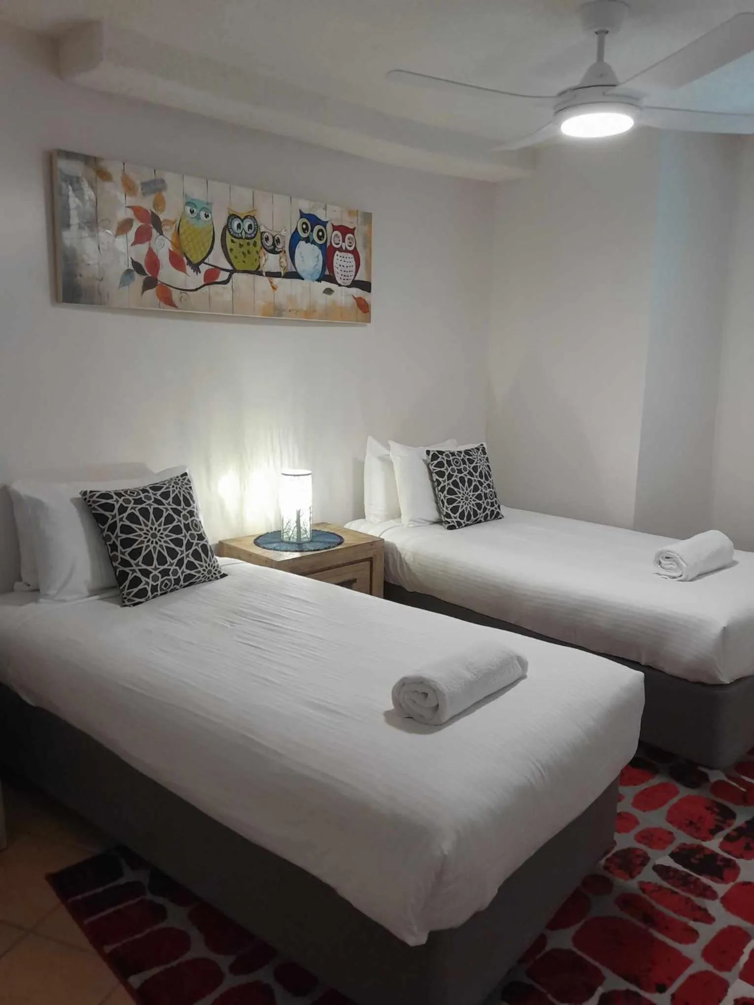 Bed in Grand Palais Boolarong Beachside Apartments