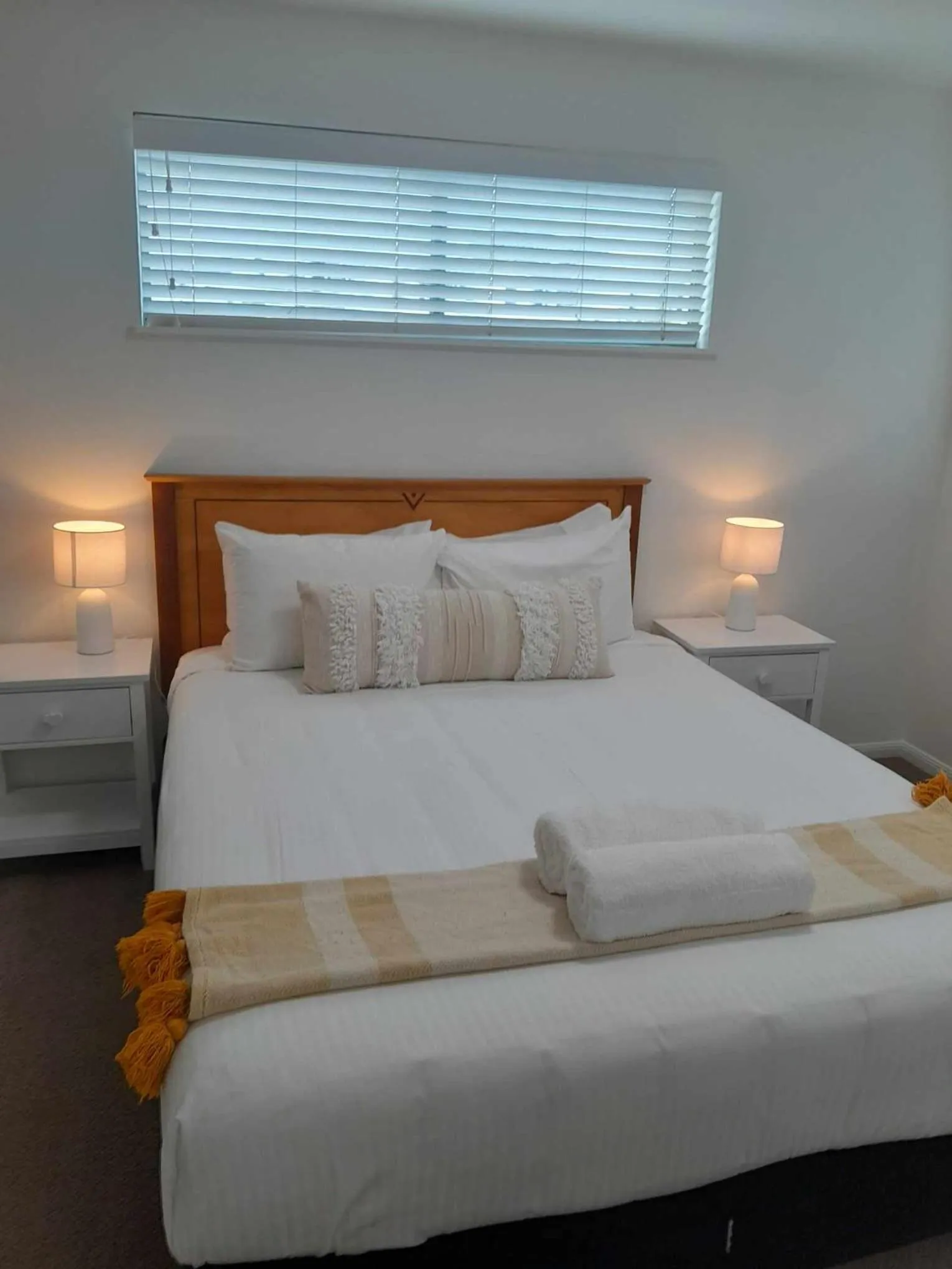 Bed in Grand Palais Boolarong Beachside Apartments