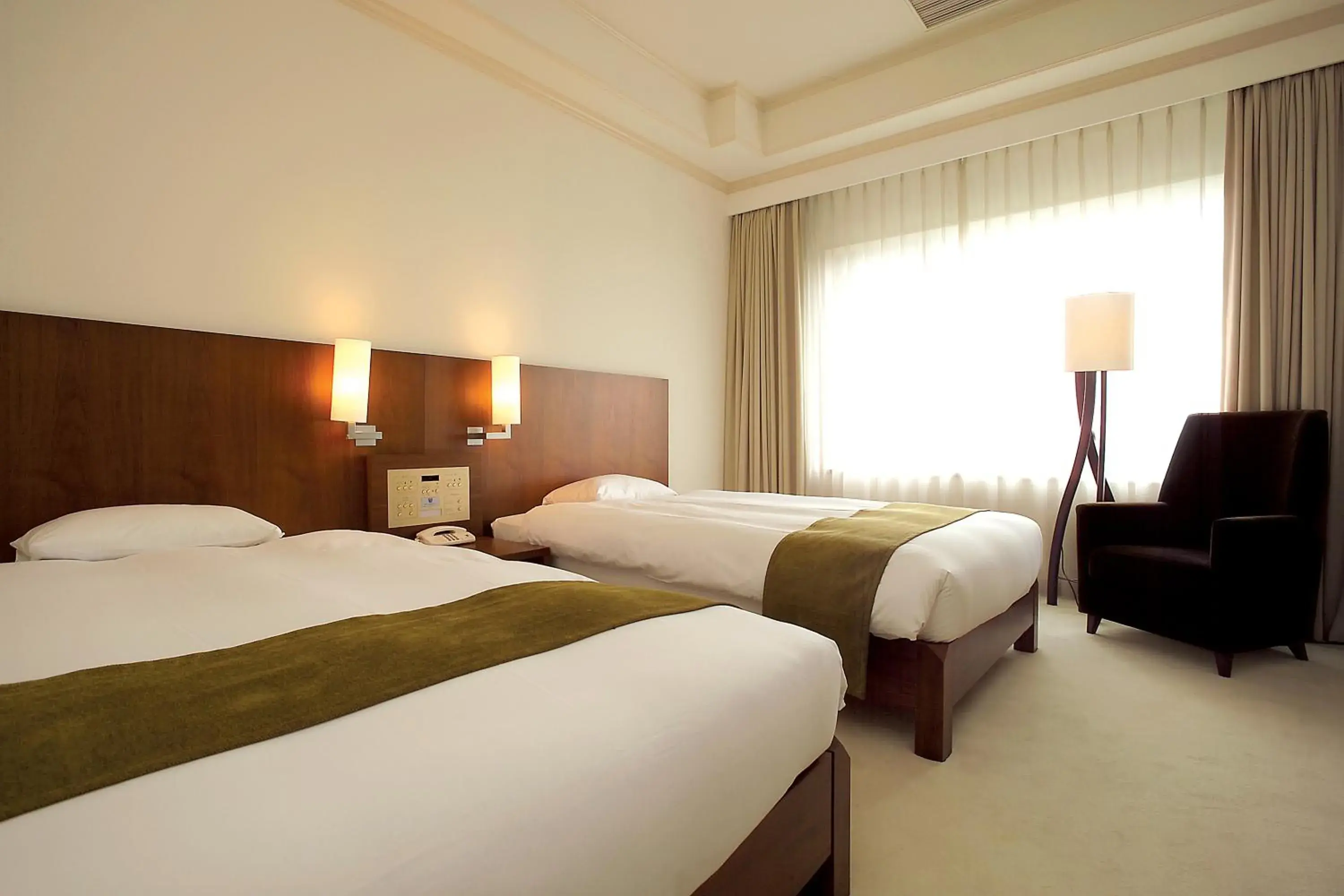 Bed in Chateraise Gateaux Kingdom Sapporo Hotel & Spa Resort Bed in Chateraise Gateaux Kingdom Sapporo Hotel & Spa Resort