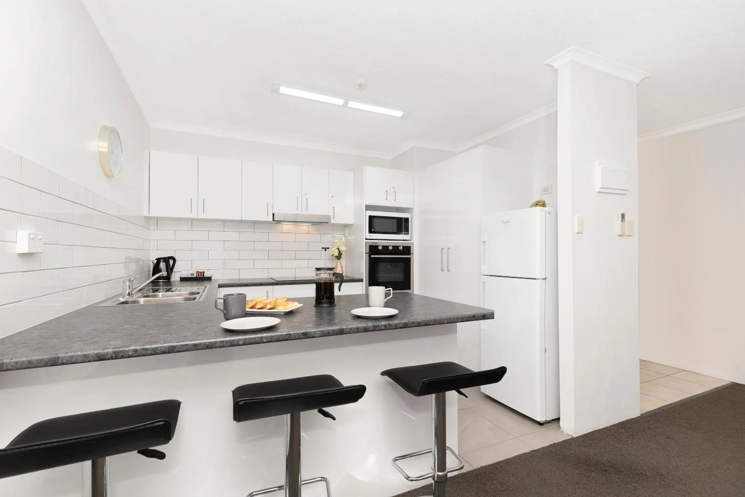 Kitchen or kitchenette in The Astor Apartments