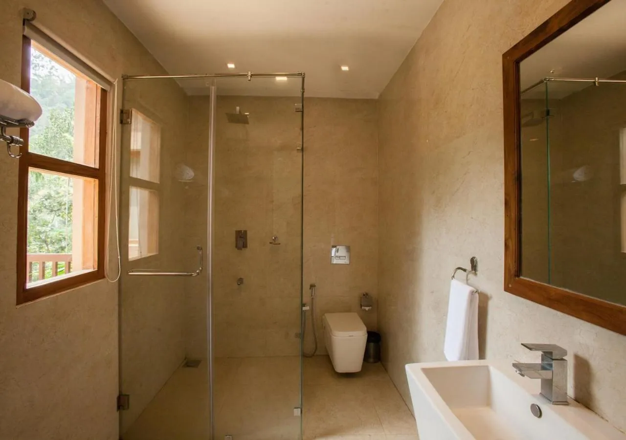 Shower in Oxygen Resorts Thekkady