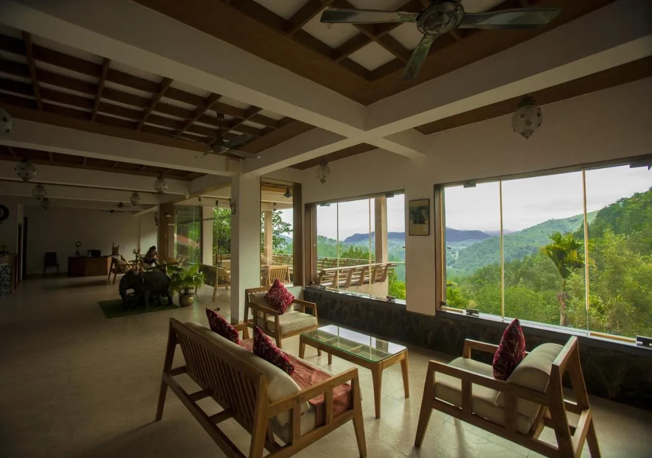 Communal lounge/ TV room in Oxygen Resorts Thekkady
