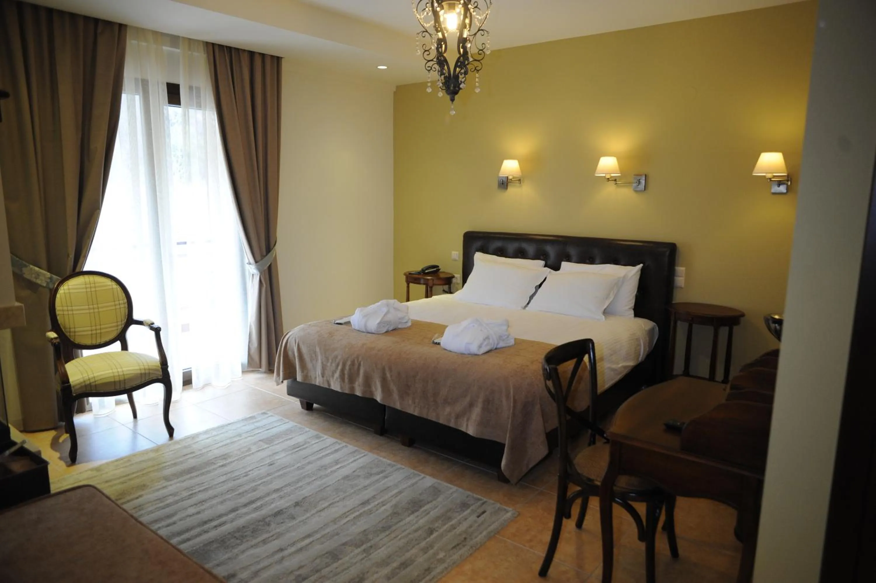 Bed in Agapi Luxury Hotel