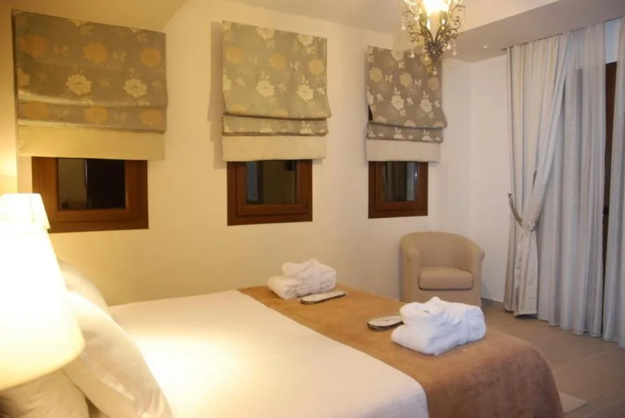 Bed in Agapi Luxury Hotel