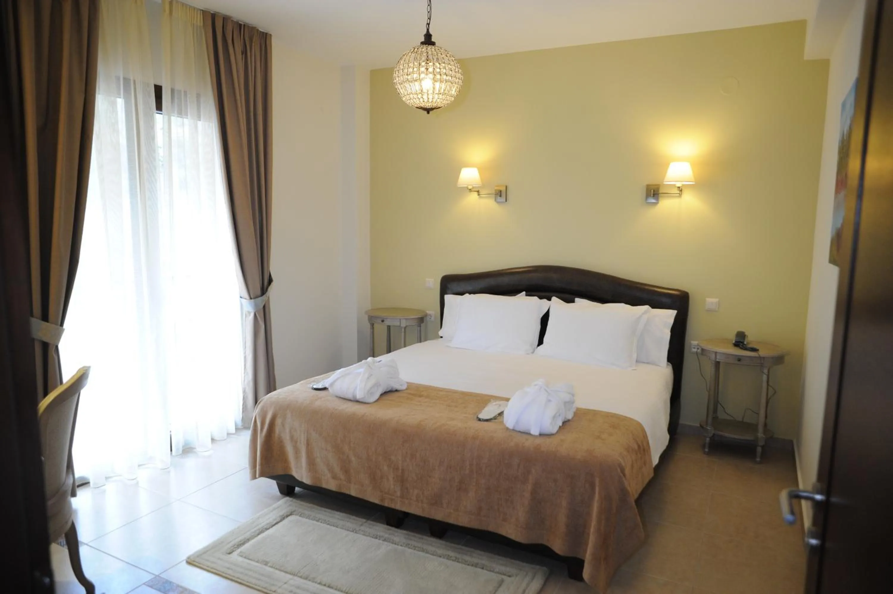 Bed in Agapi Luxury Hotel